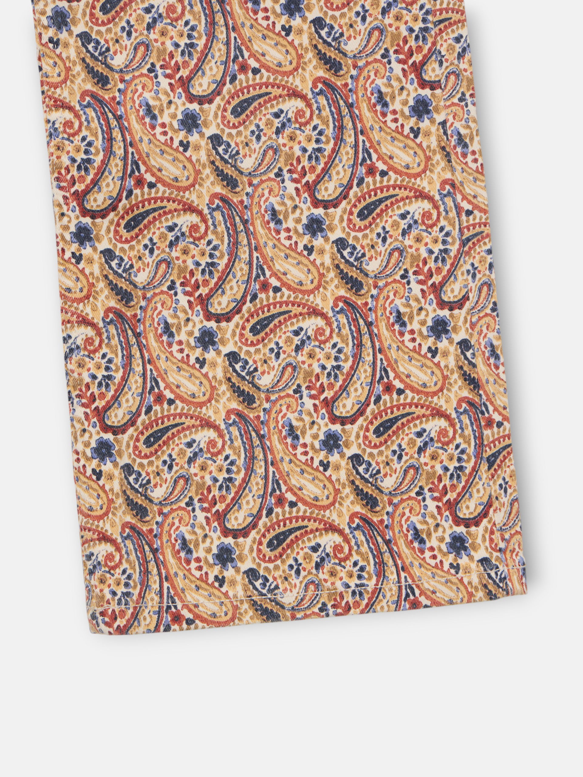 Printed denim trousers with orange paisley