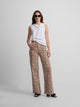 Printed denim trousers with orange paisley