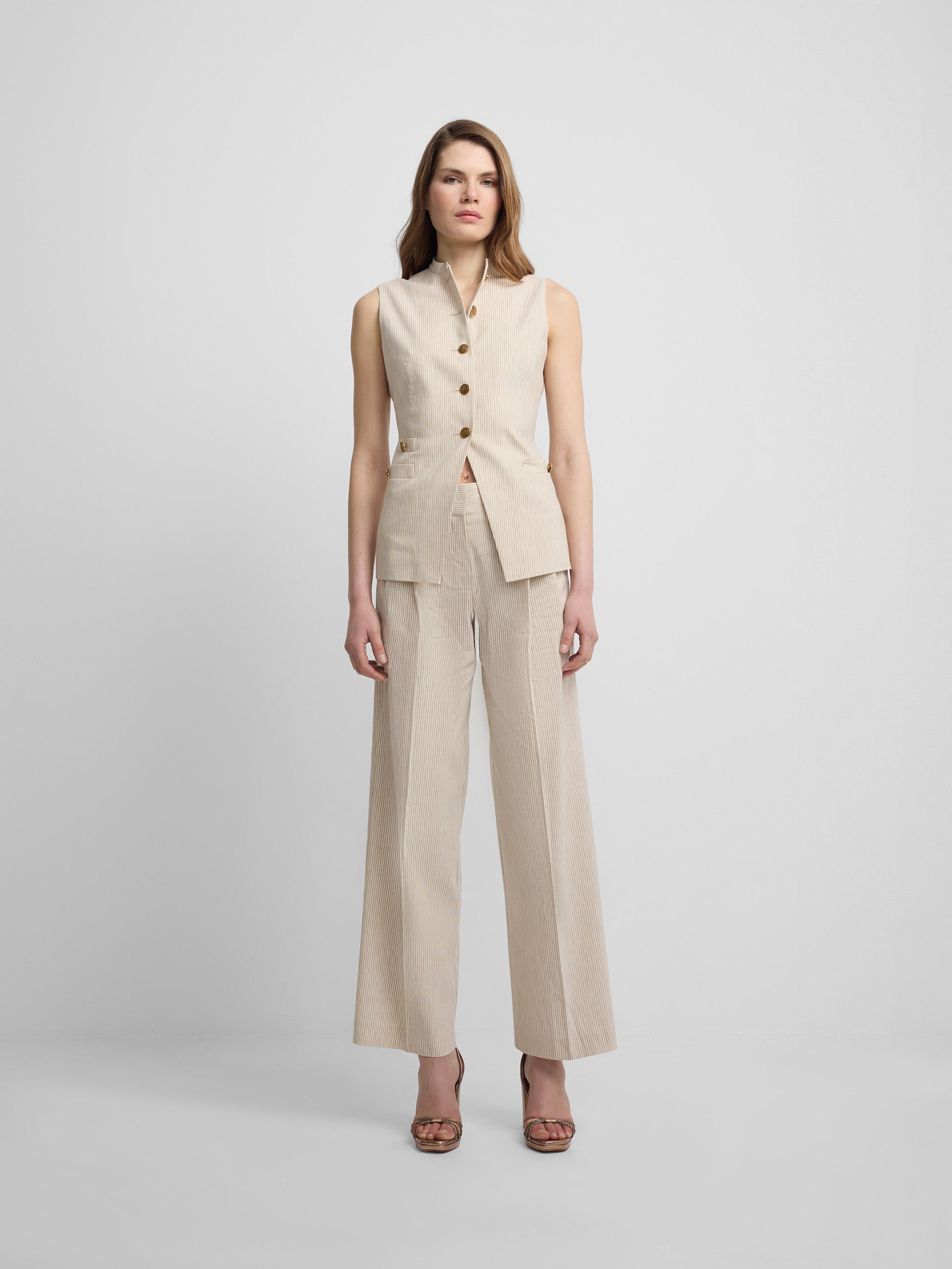 Pantalon recto rayas beige