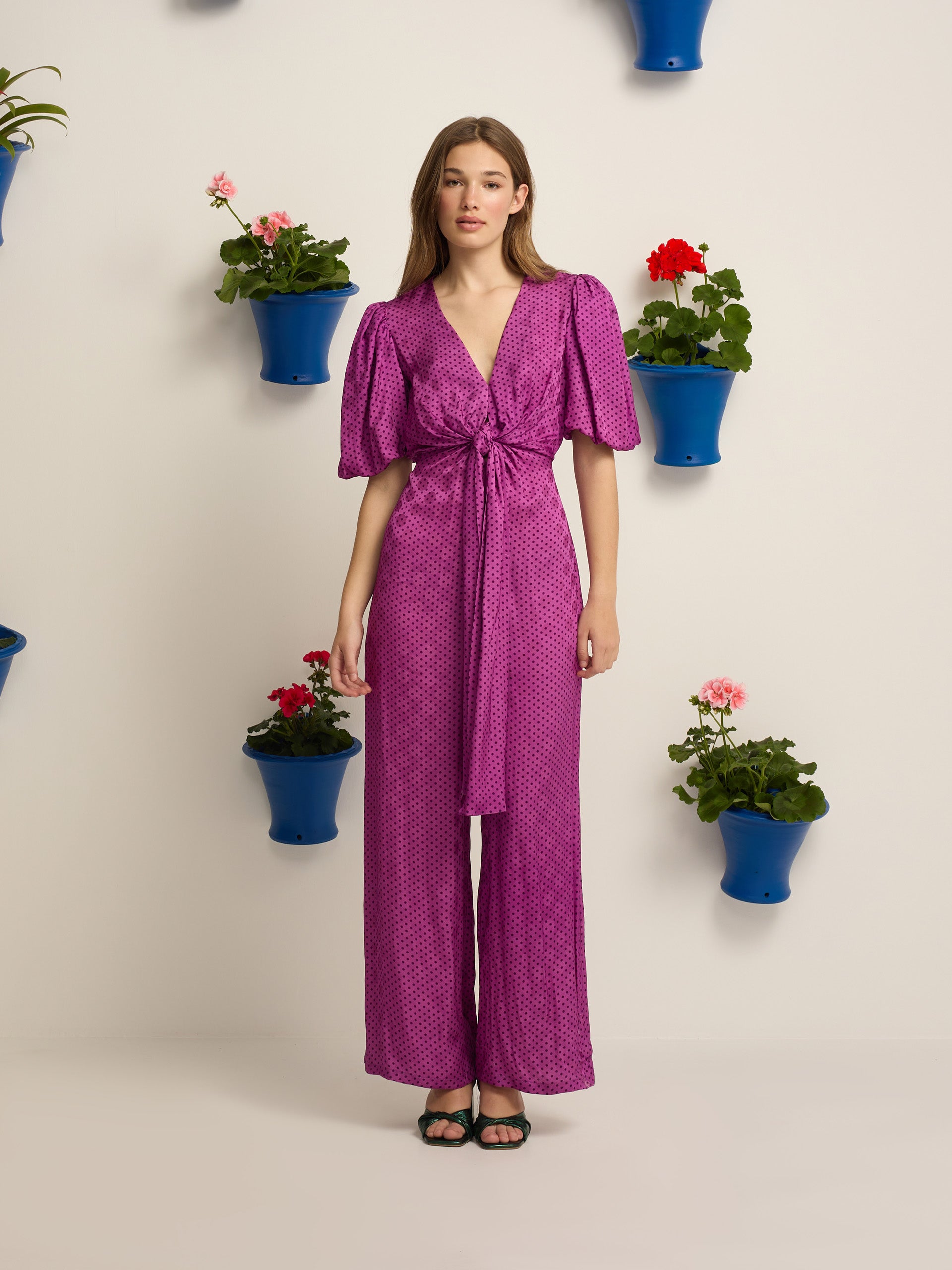 Purple polka dot knot event jumpsuit