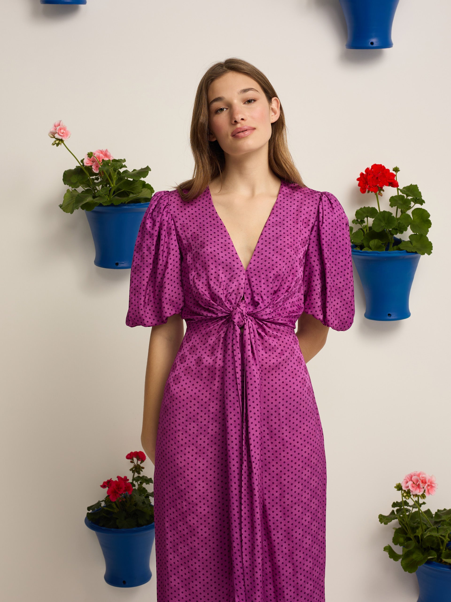 Purple polka dot knot event jumpsuit