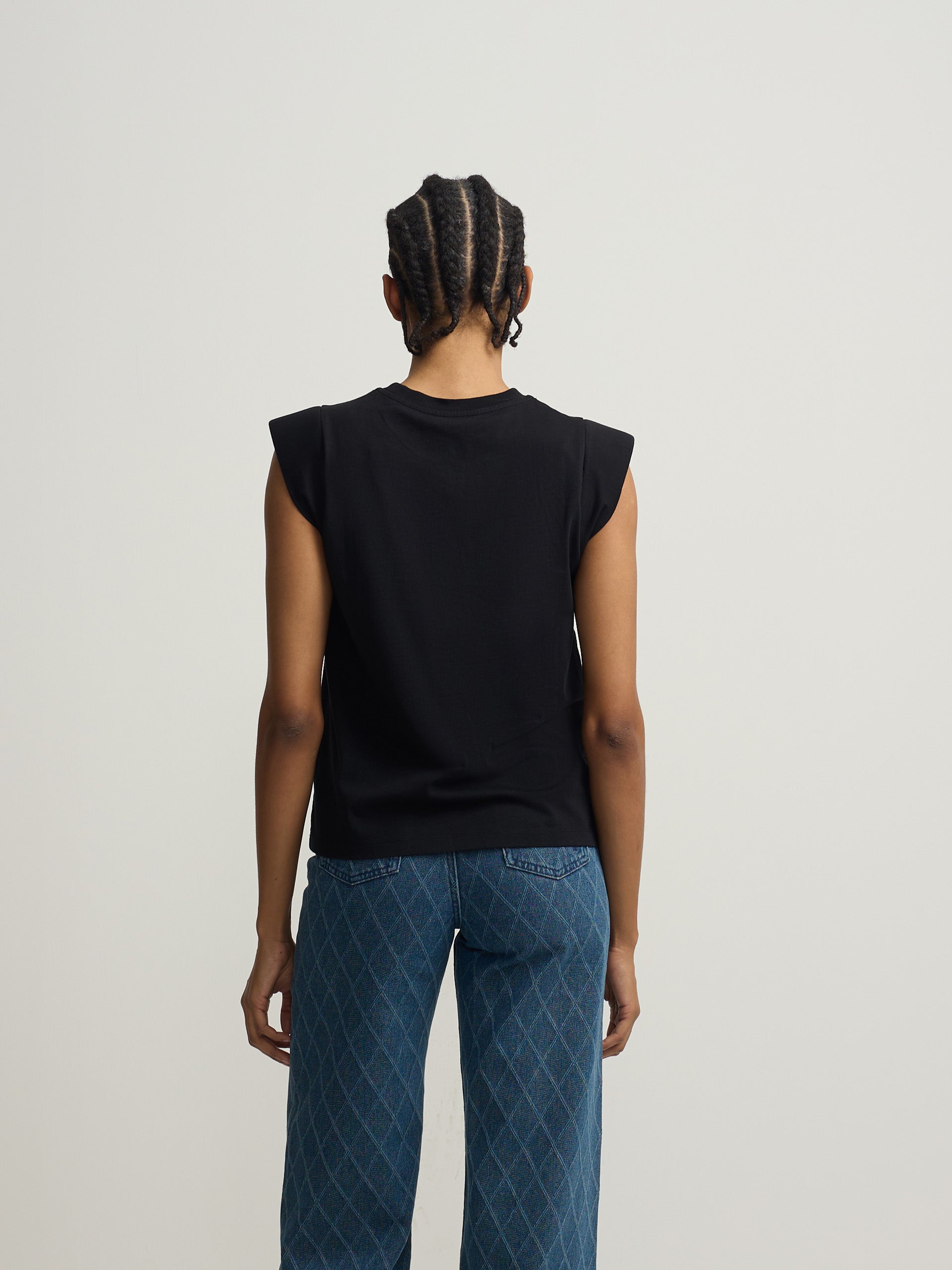 Camiseta woman negra hombreras aplicacion cristal