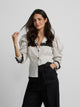 Camisa estampado combinado rayas y lunares blanca