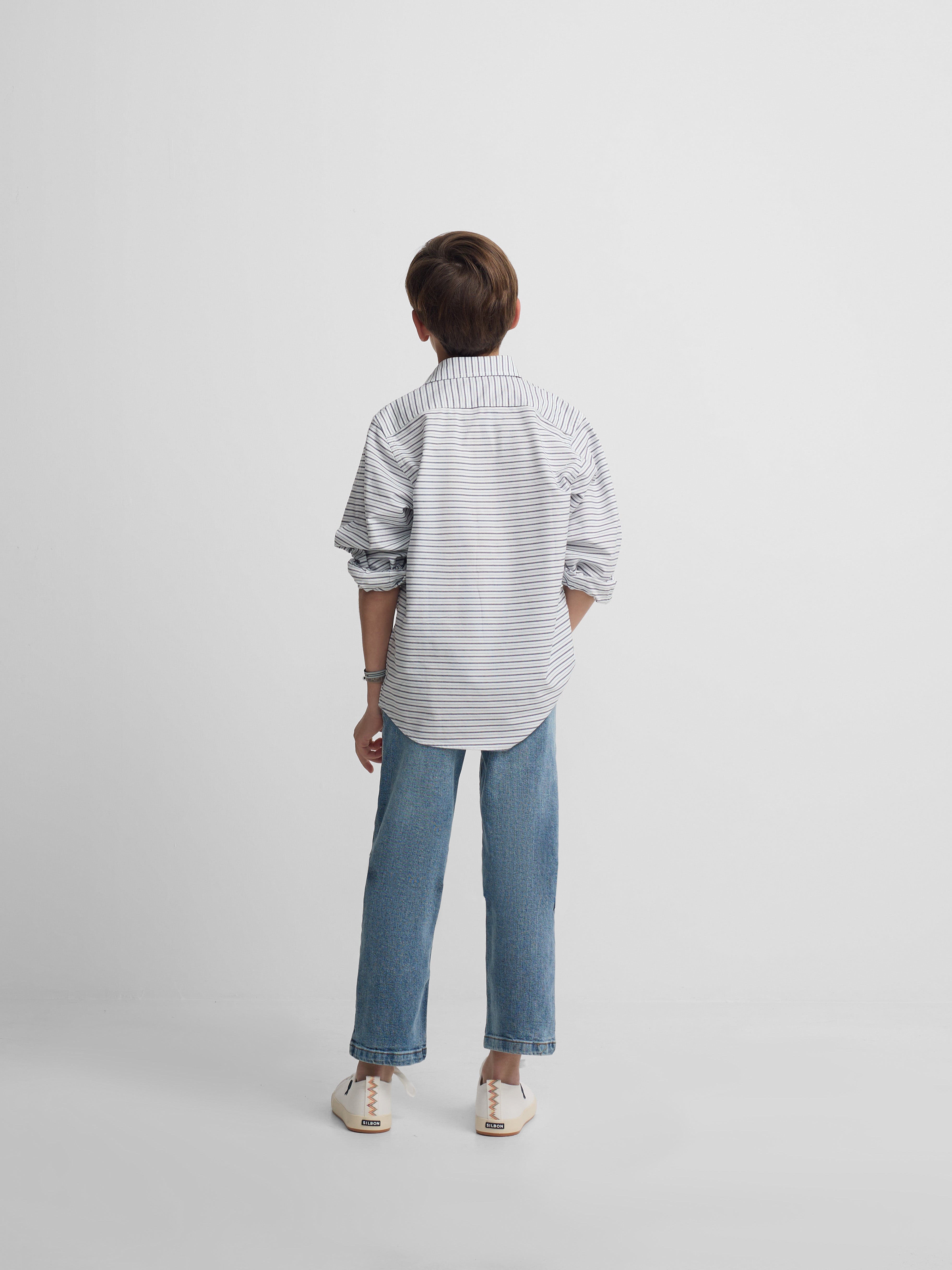 Polera sport kids oxford raya crema azul marino