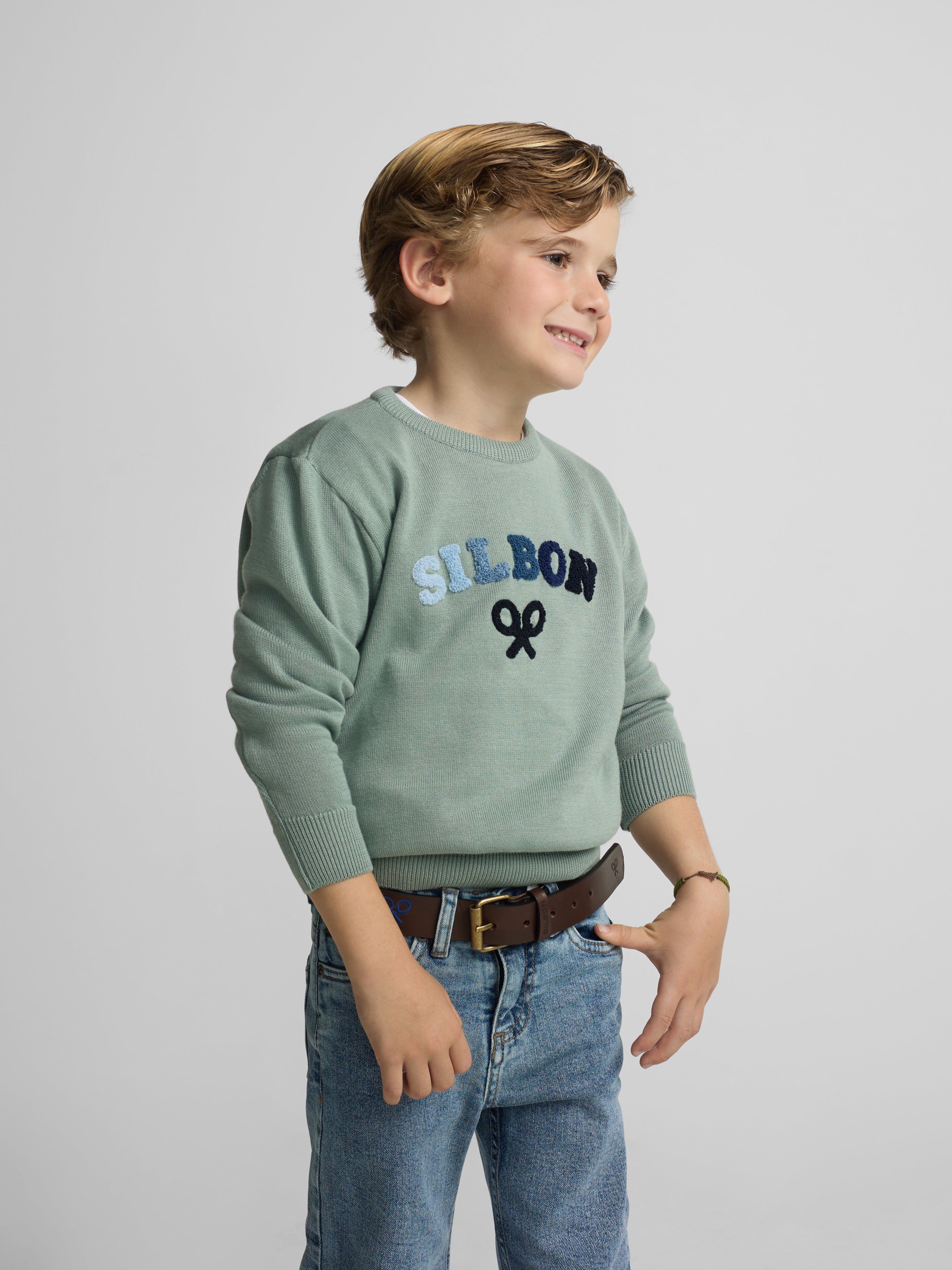 Kids sweater with colored letters in green