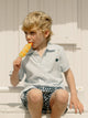 Polo kids liso logo rizo azul claro