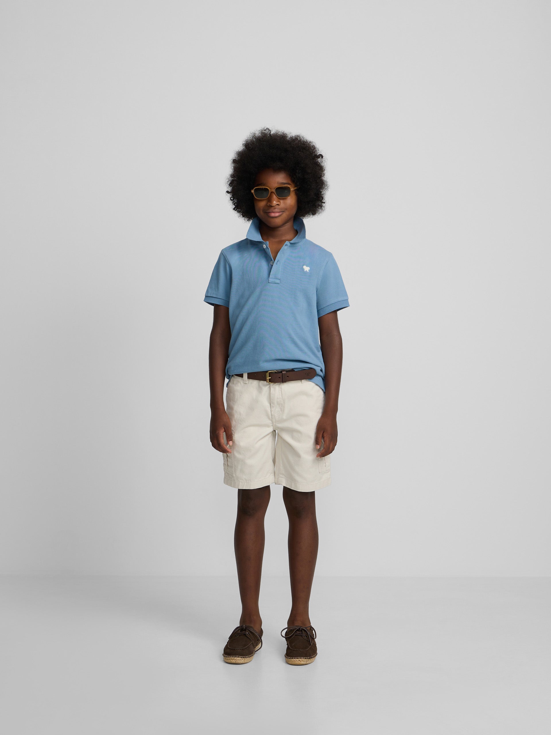 Polo kids liso logo rizo azul medio