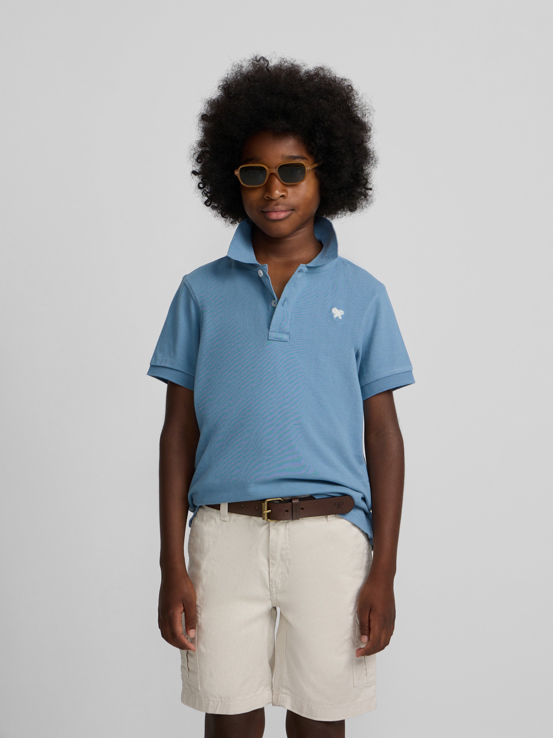 Polo kids liso logo rizo azul medio