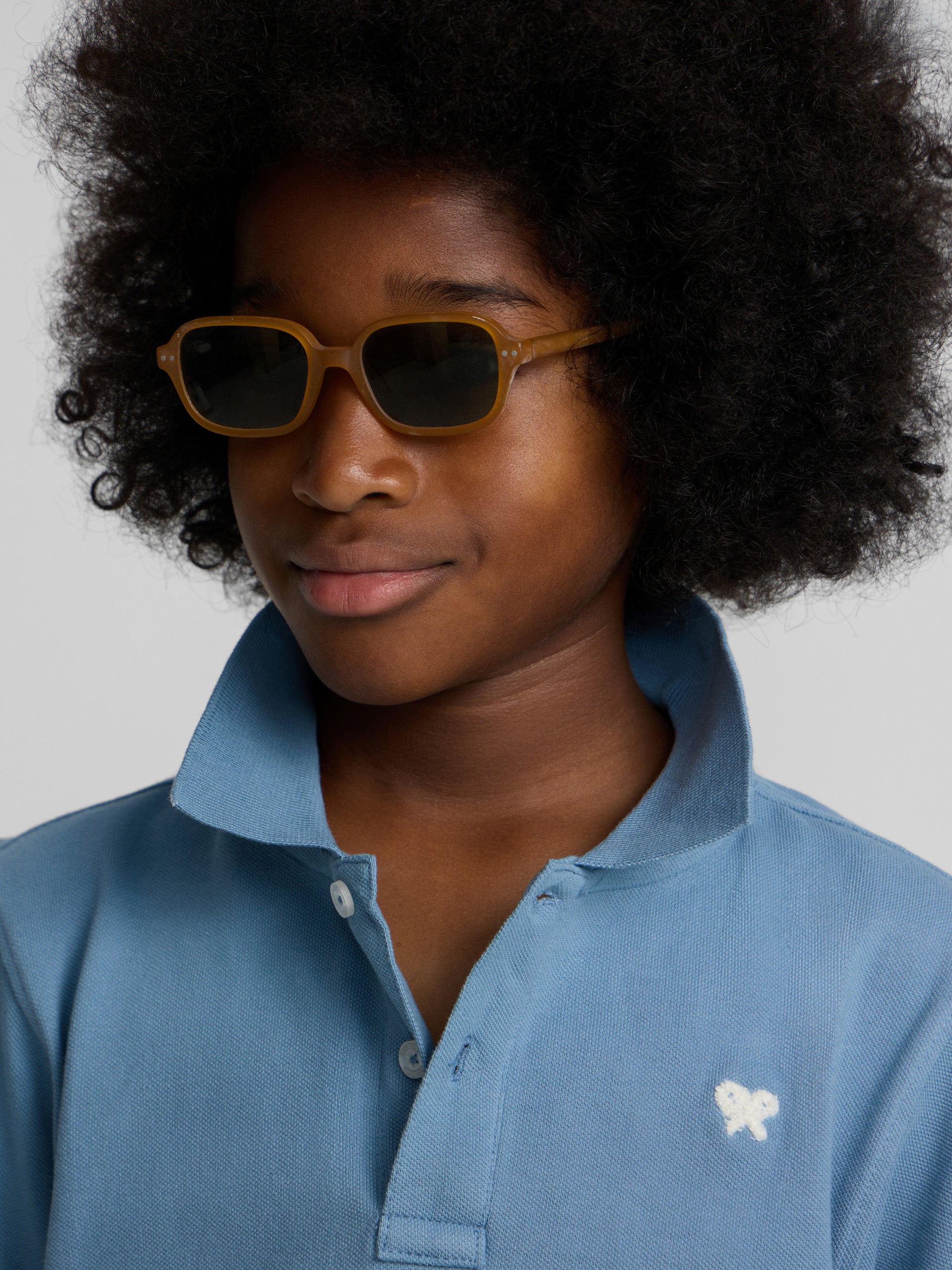 Polo kids liso logo rizo azul medio