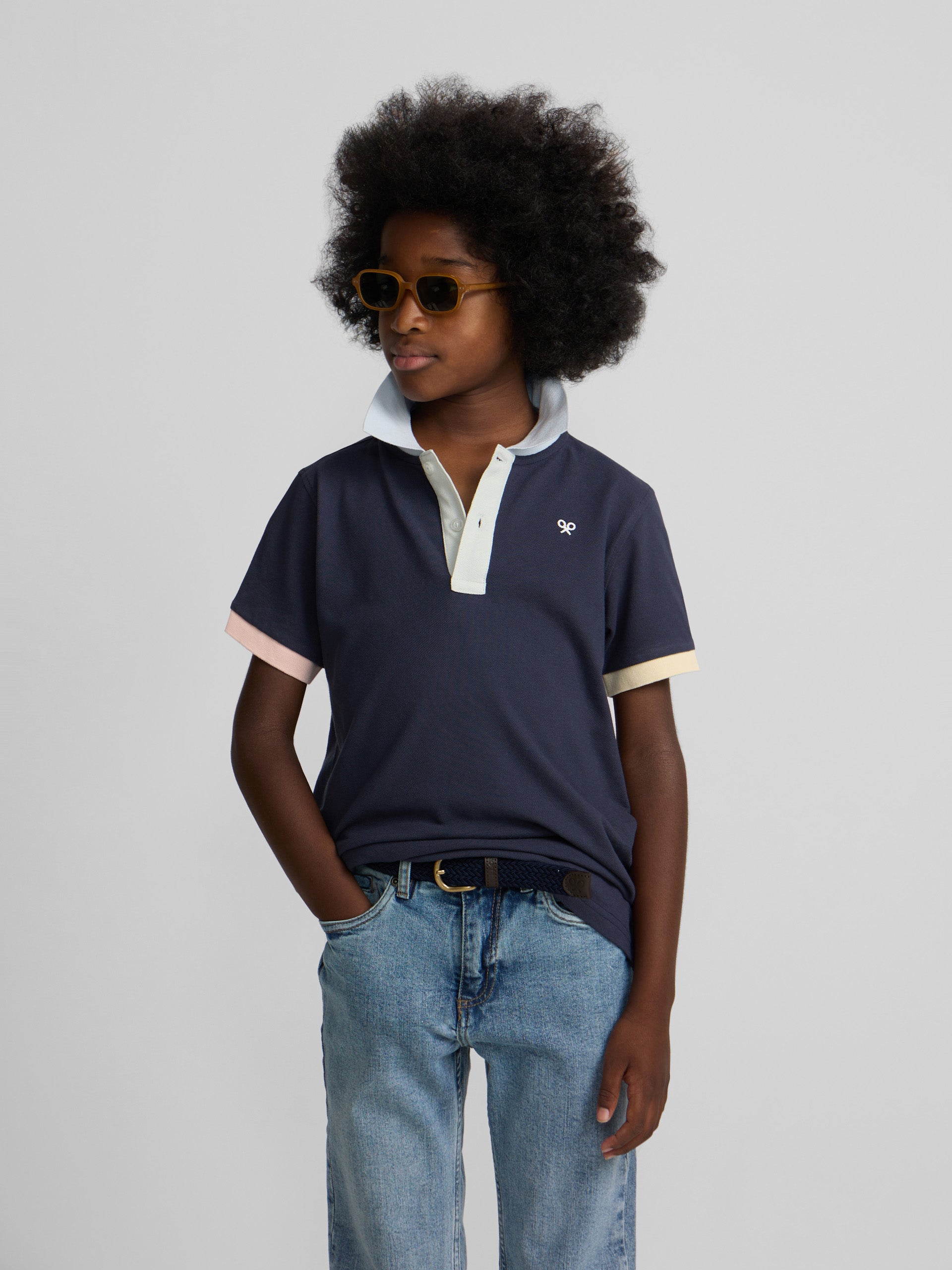 Polo kids ribete multicolor azul marino