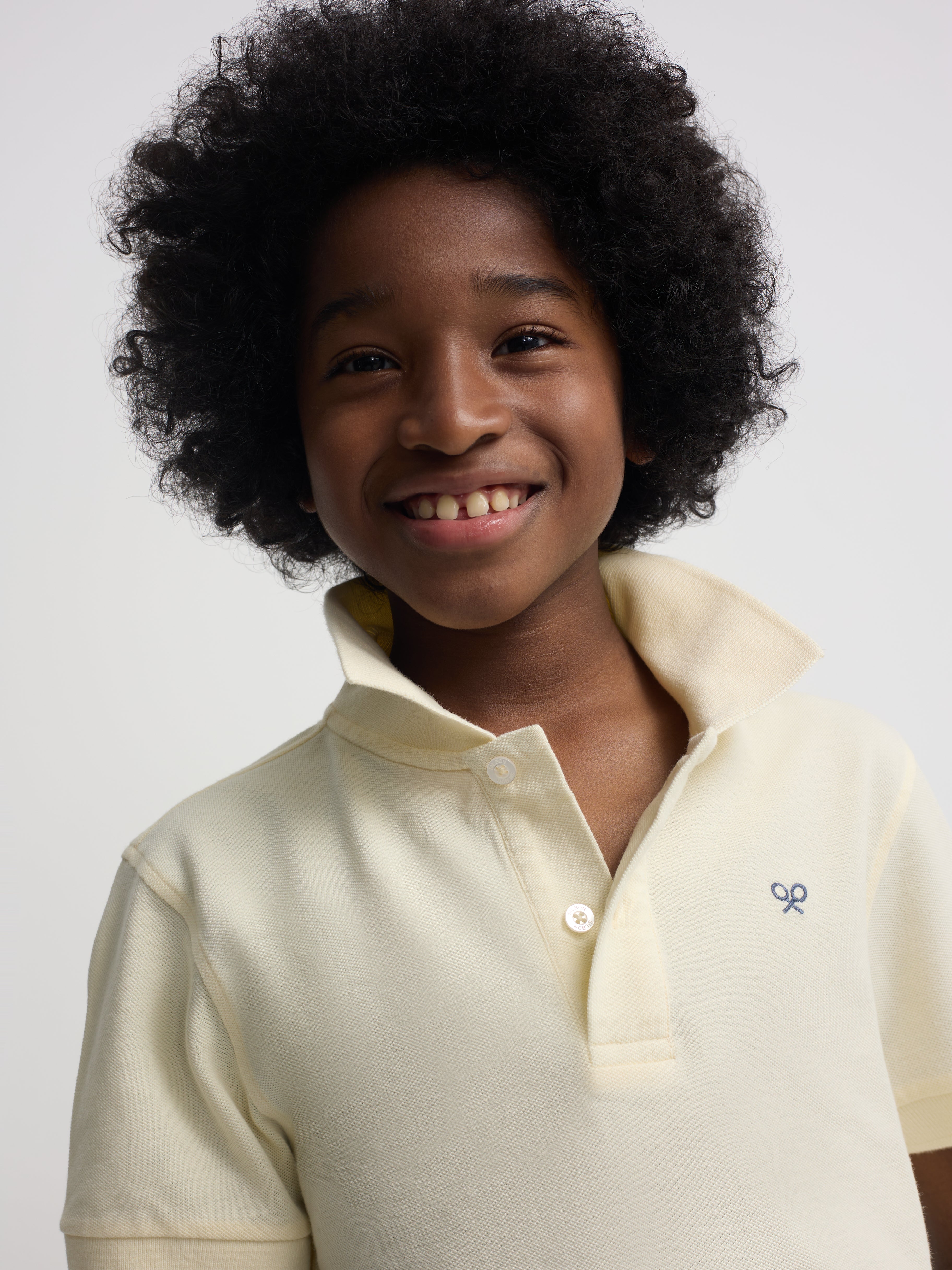 Polo kids raqueta etnica amarillo