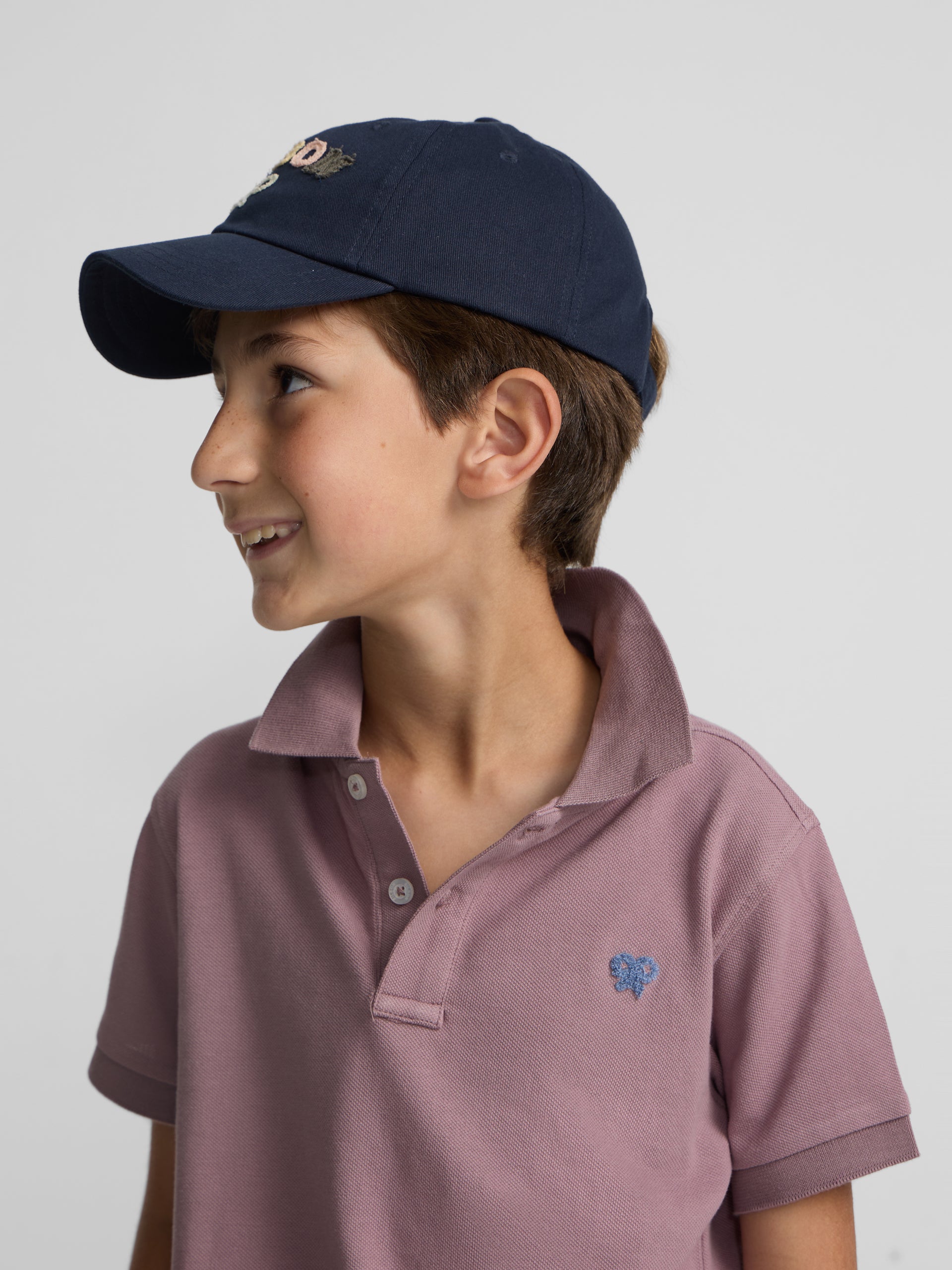 Polo kids liso logo rizo burdeos