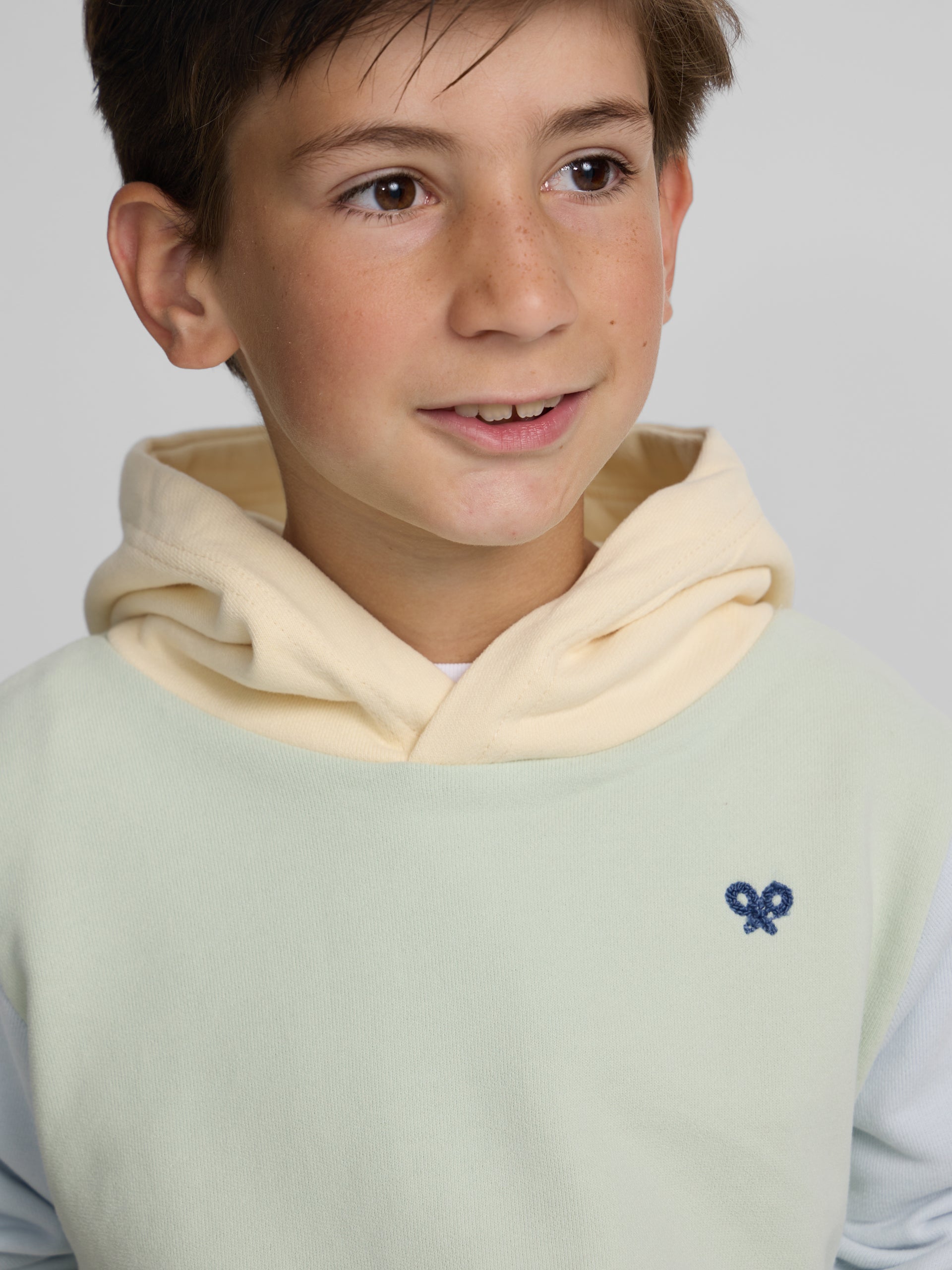 Kids hoodie with ethnic racket print in green