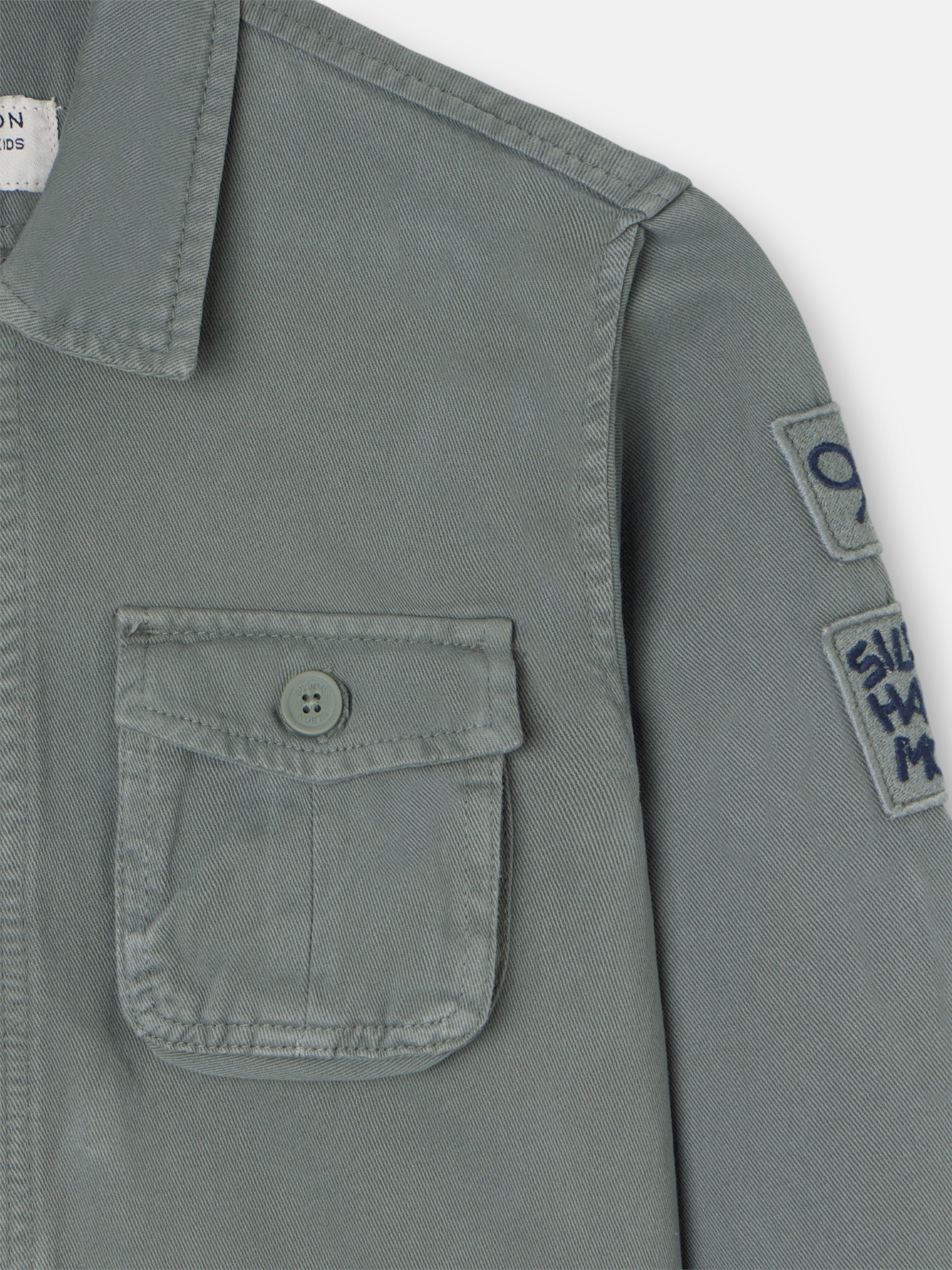 Kids jacket with patch pockets in green