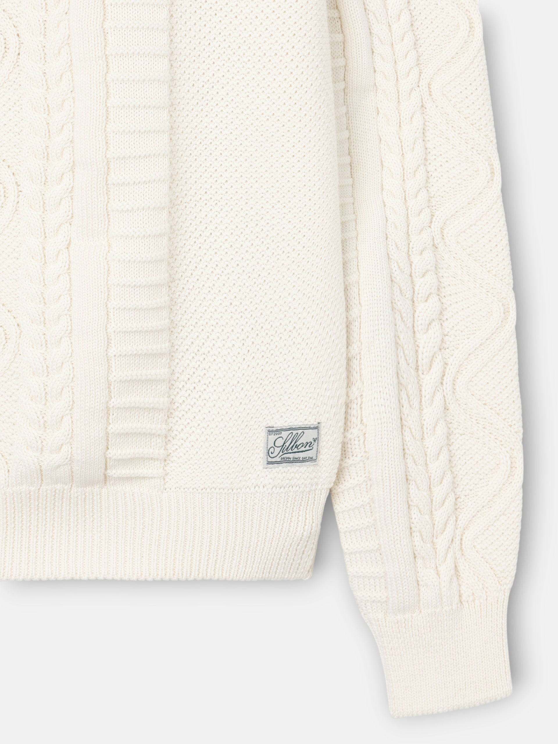 Pull torsadé patch cruise crème