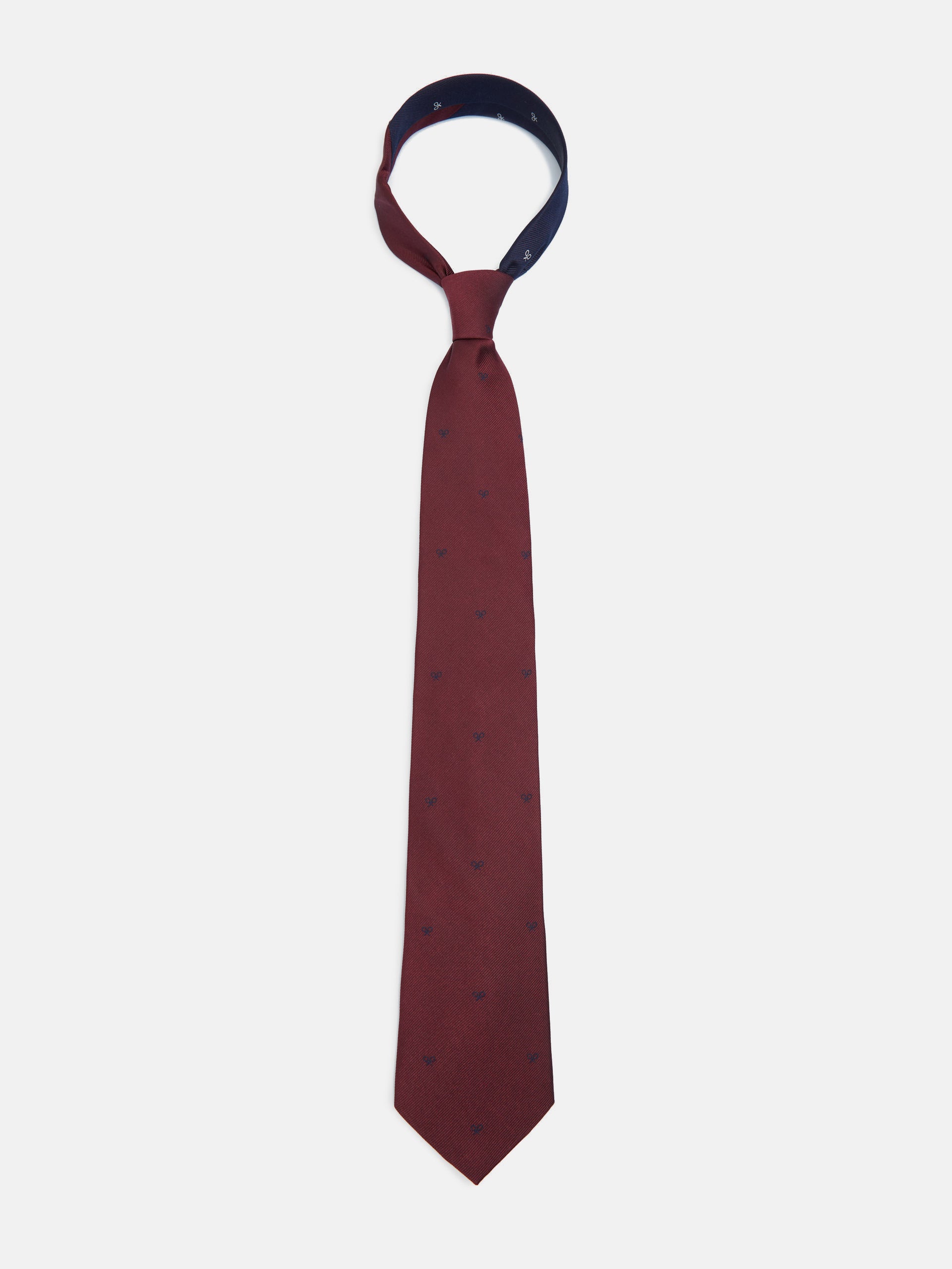 Corbata silbon motivos raquetas burdeos