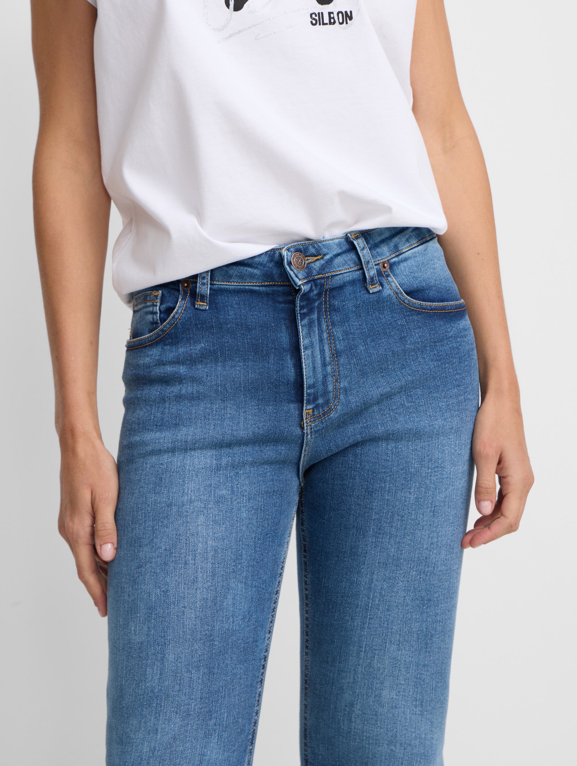 Calças de mulher slim fit ganga média