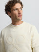 Sweat-shirt raquette en relief ton crème
