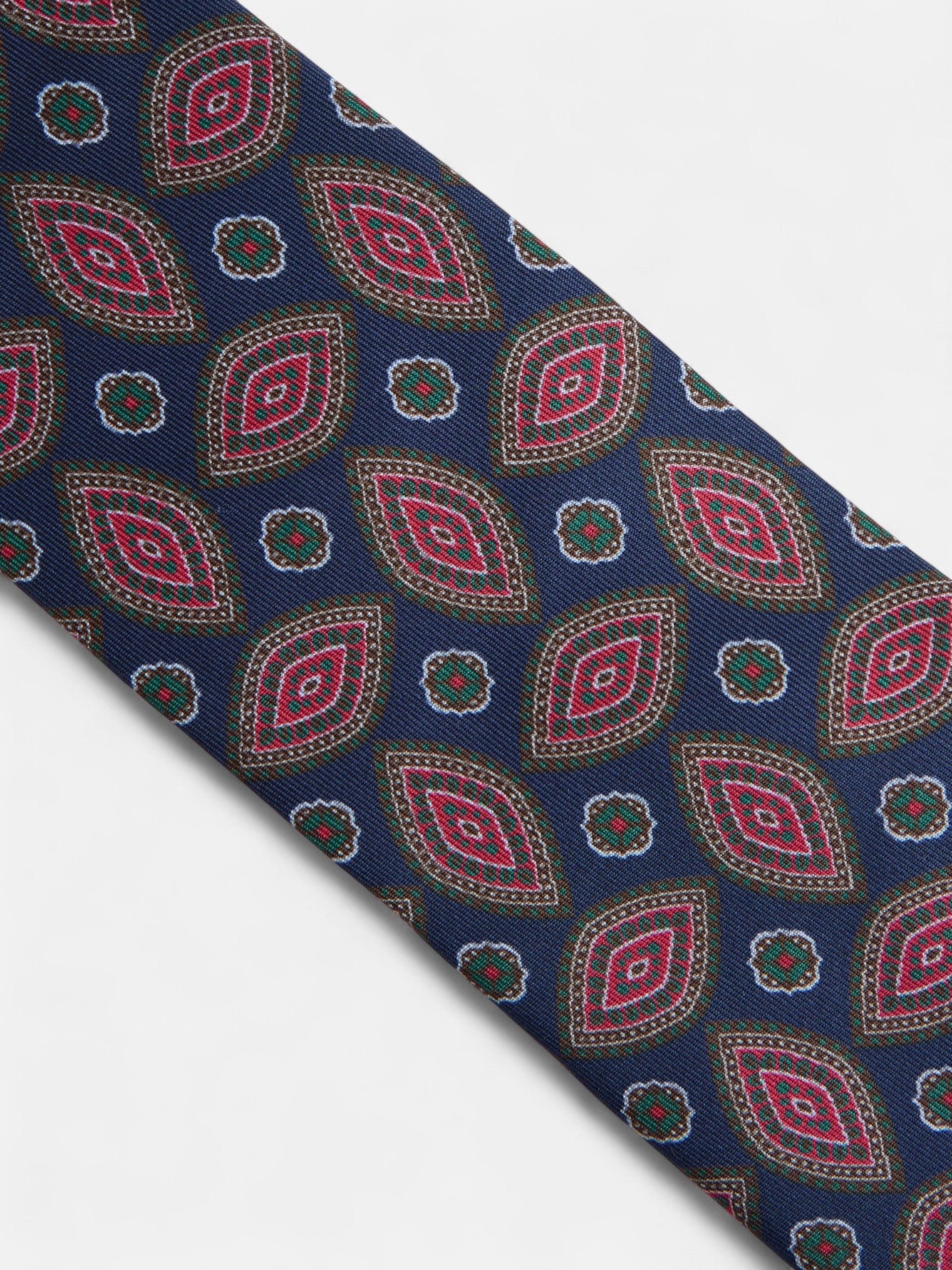 Vintage tie with navy blue oval pattern