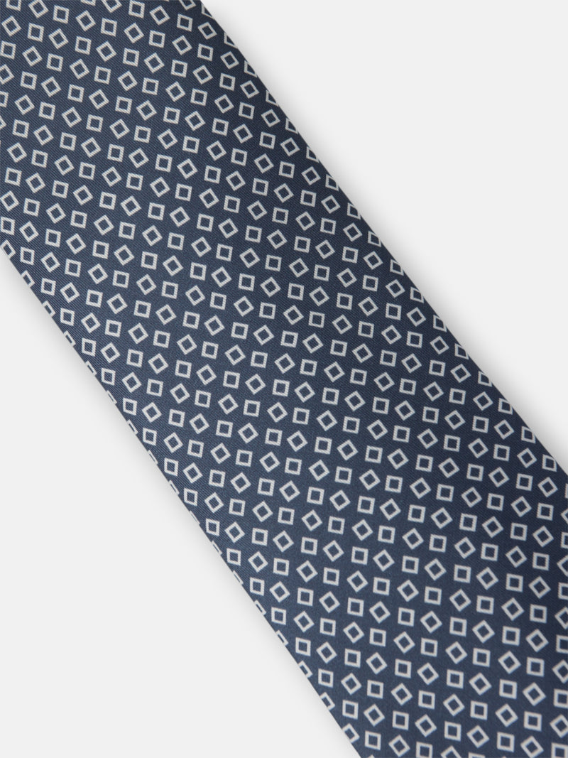 Cravate à motif carreaux irréguliers bleu marine
