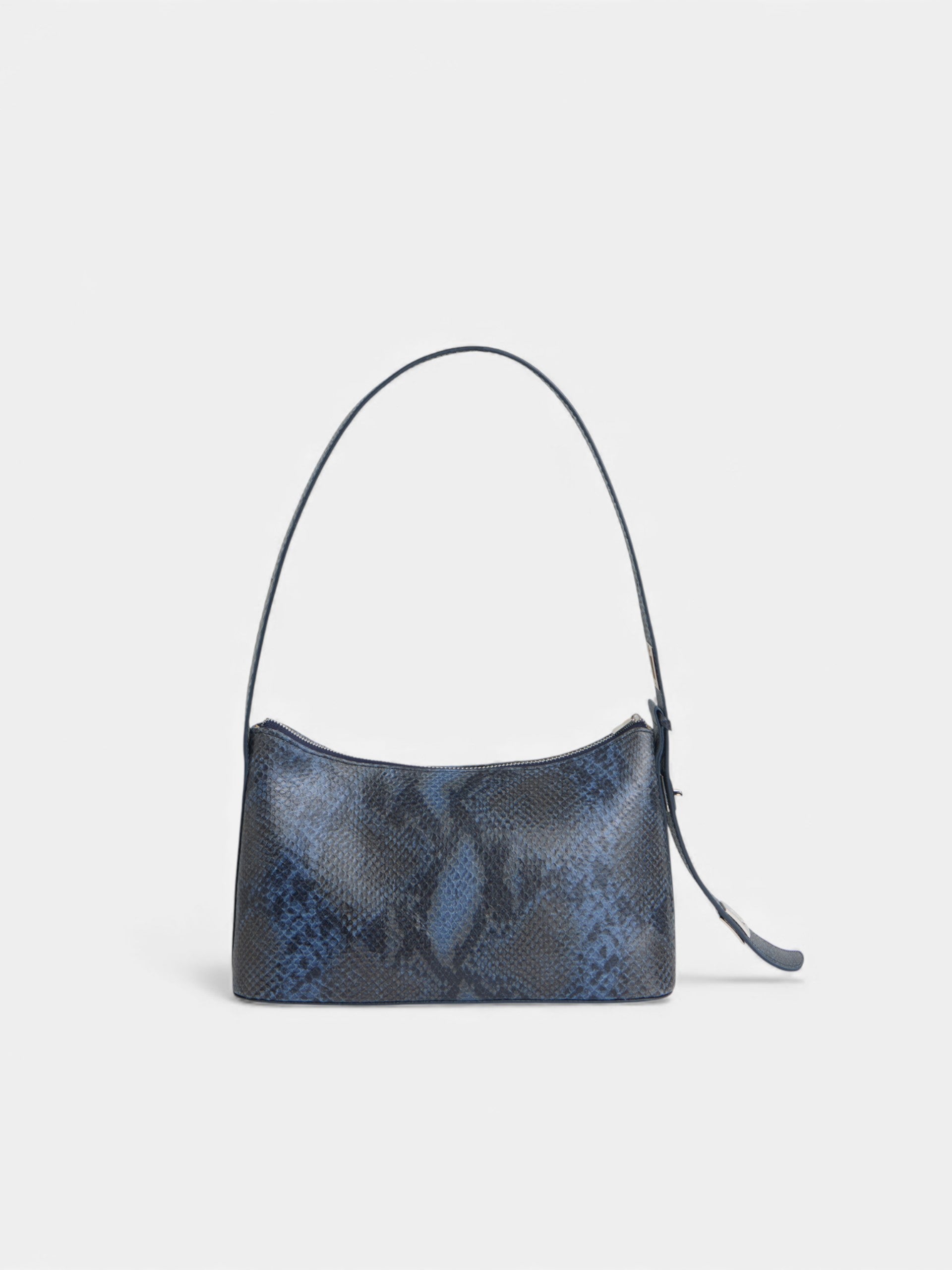 Bolso pochette piel animal print azul