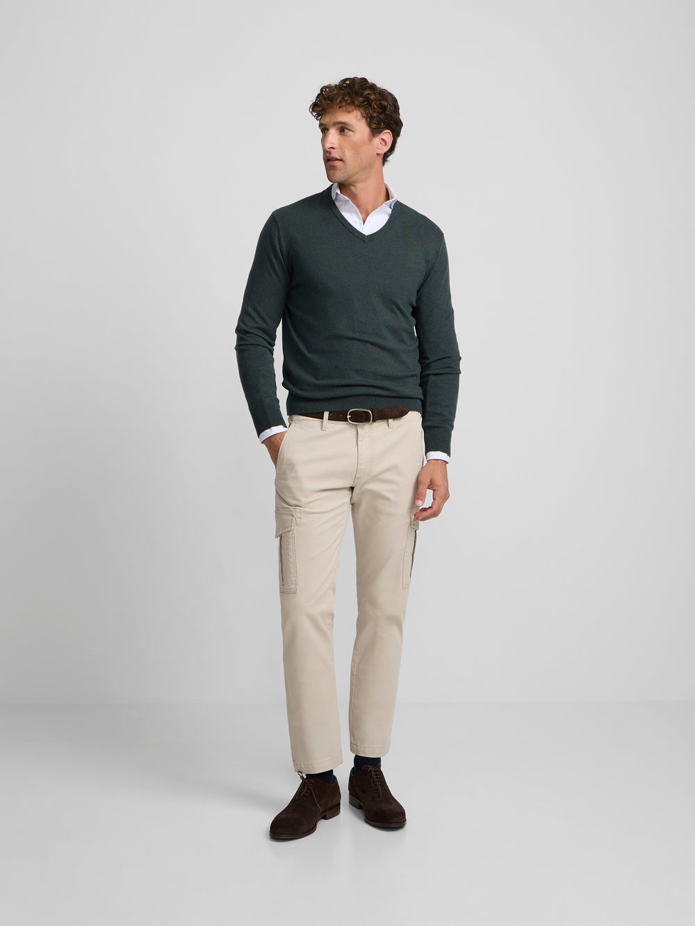 Green V-neck sweater