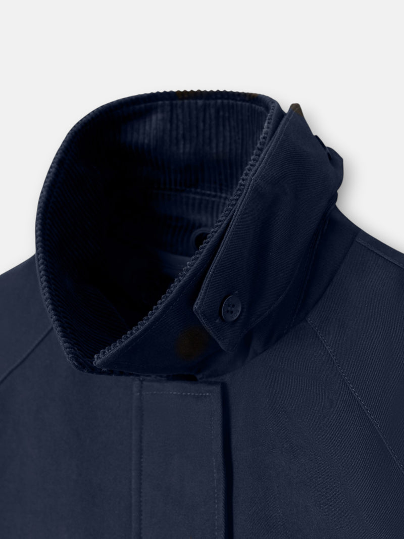 Manteau bleu marine à fermeture métallique
