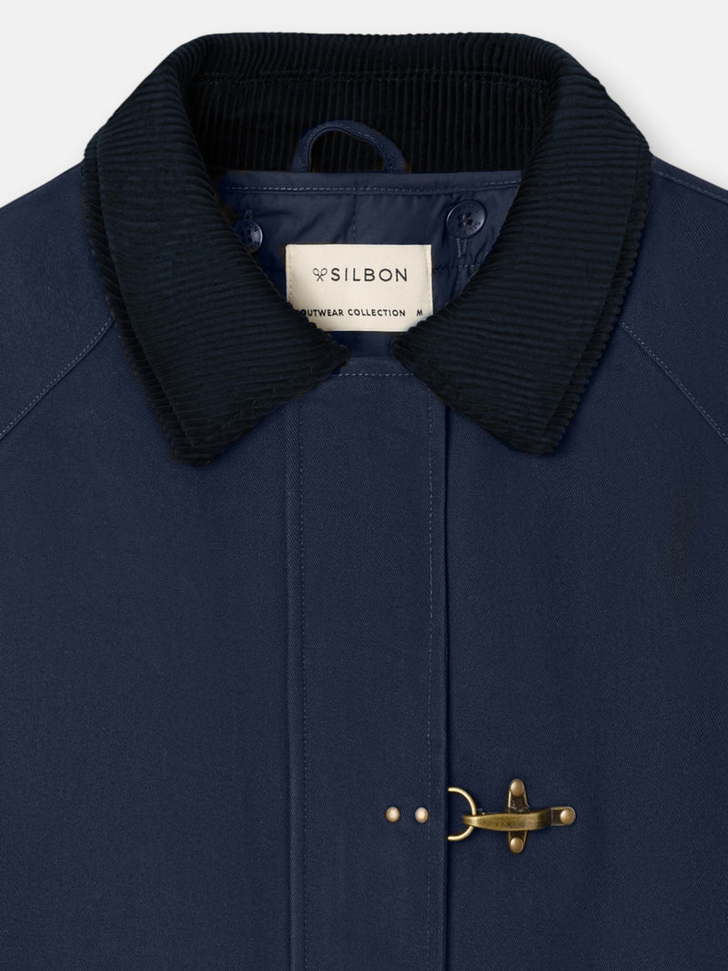 Manteau bleu marine à fermeture métallique