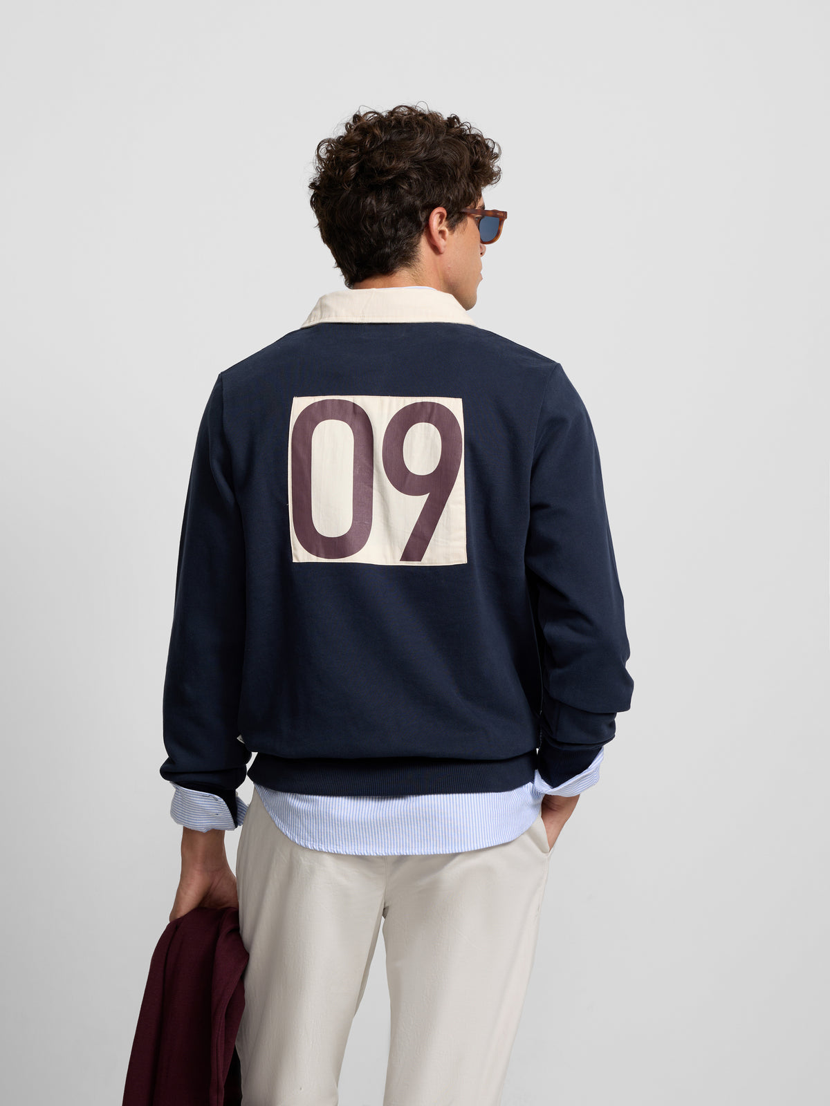 Sudadera cuello polo parche azul marino
