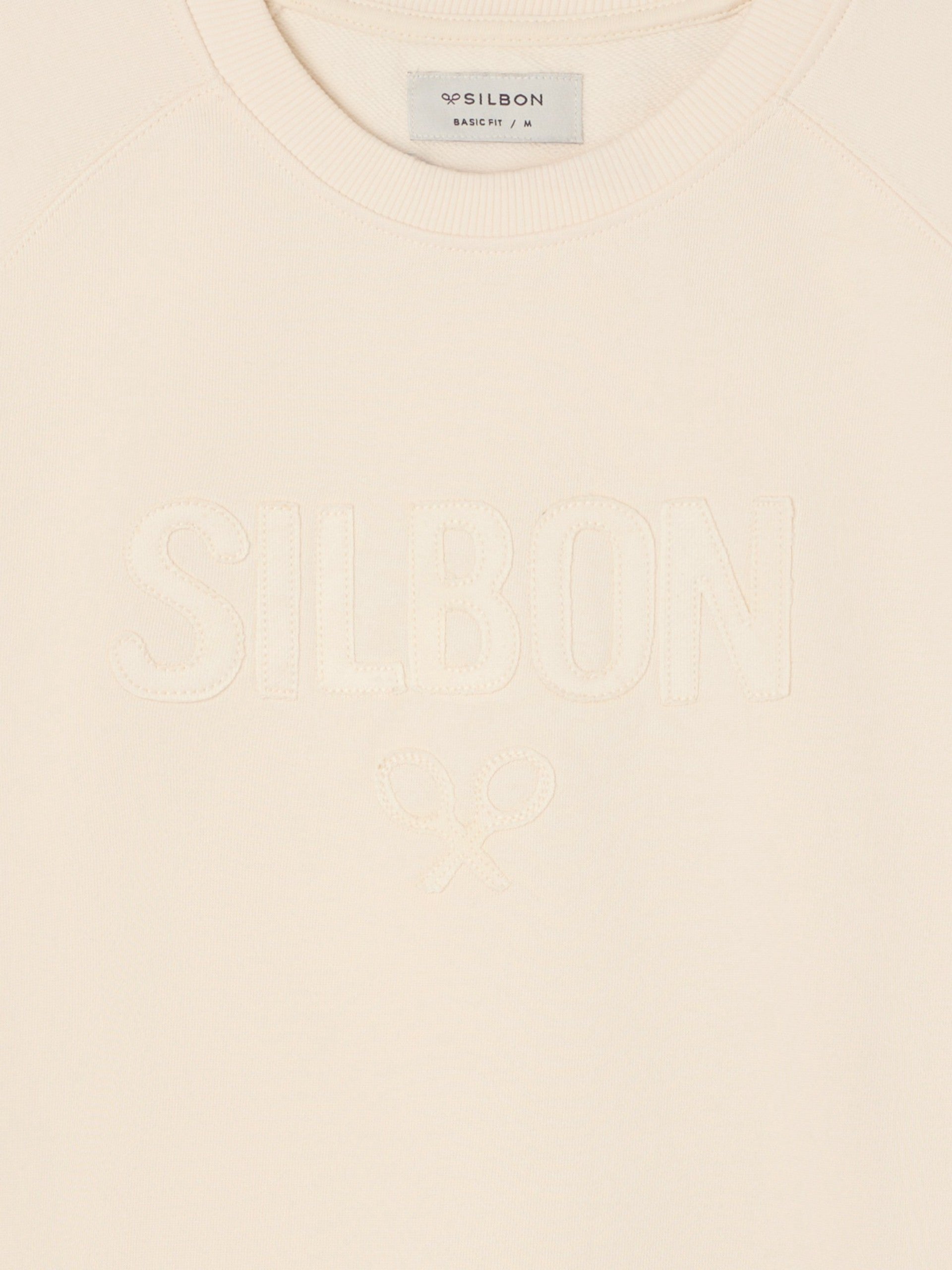 Sudadera ranglan silbon patch crema