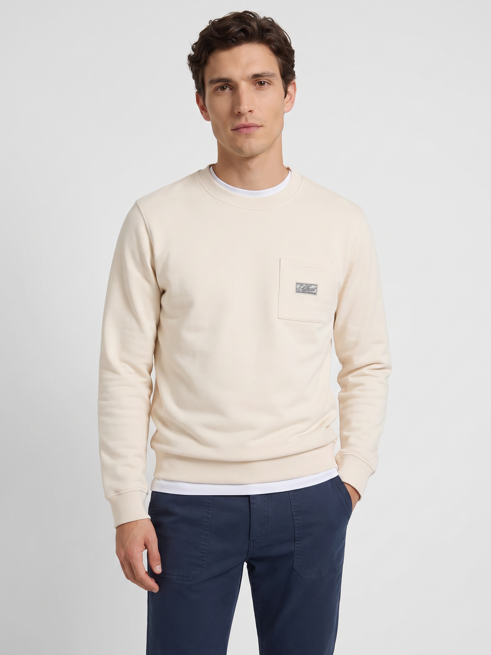 Sweatshirt bolso etiqueta creme