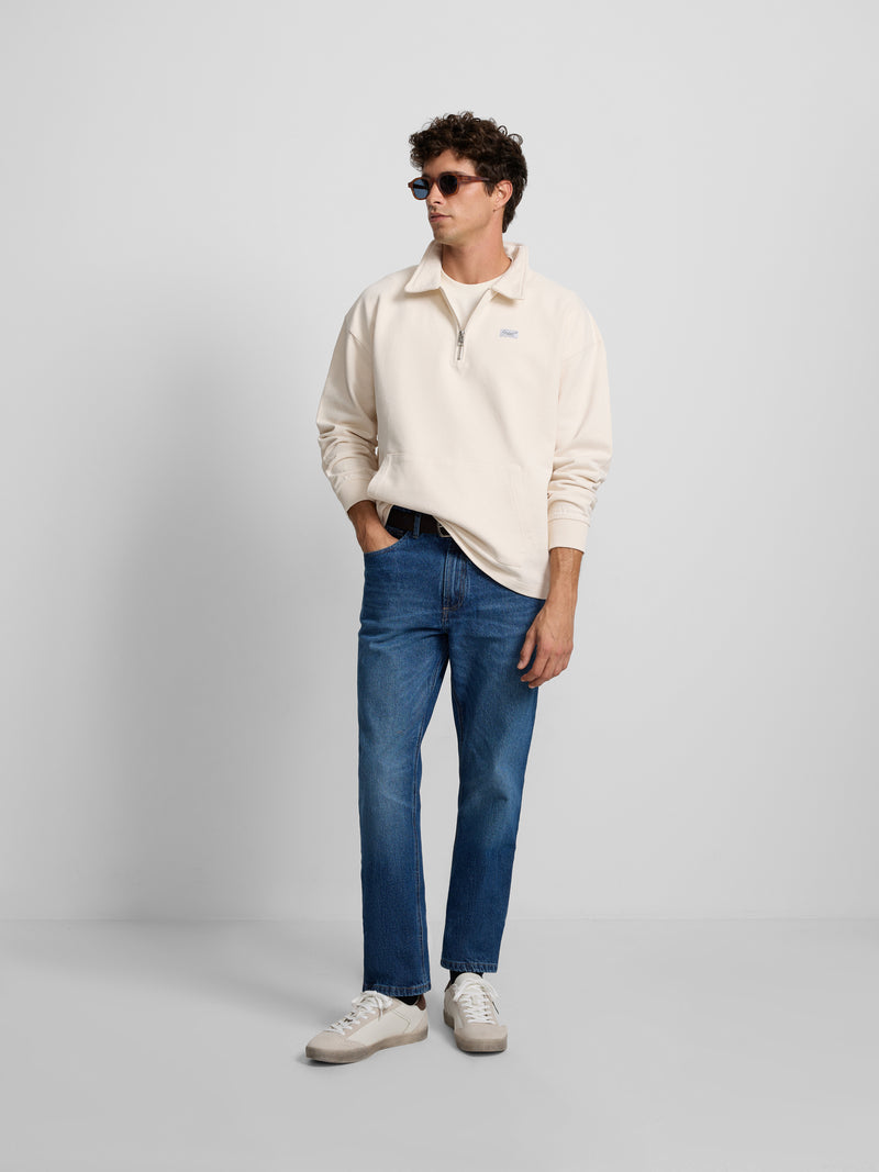 Sudadera relaxed fit media cremallera etiqueta crema