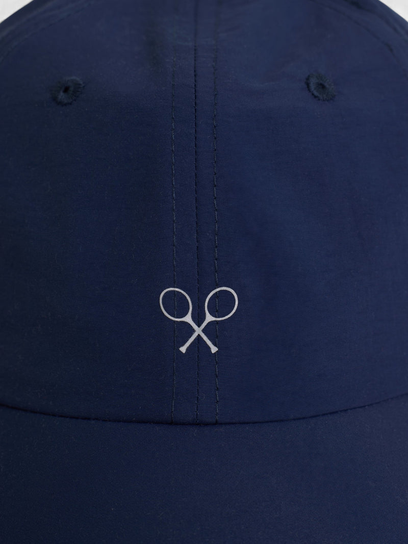 Casquette en tissu technique raquettes bleu marine