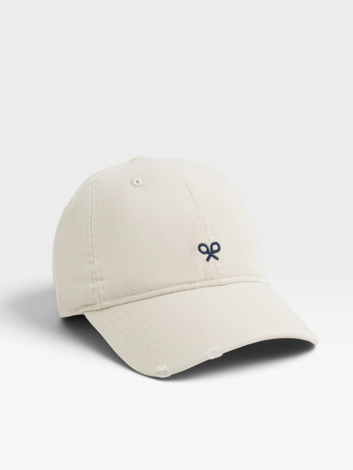 Gorra raquetas bordadas beige