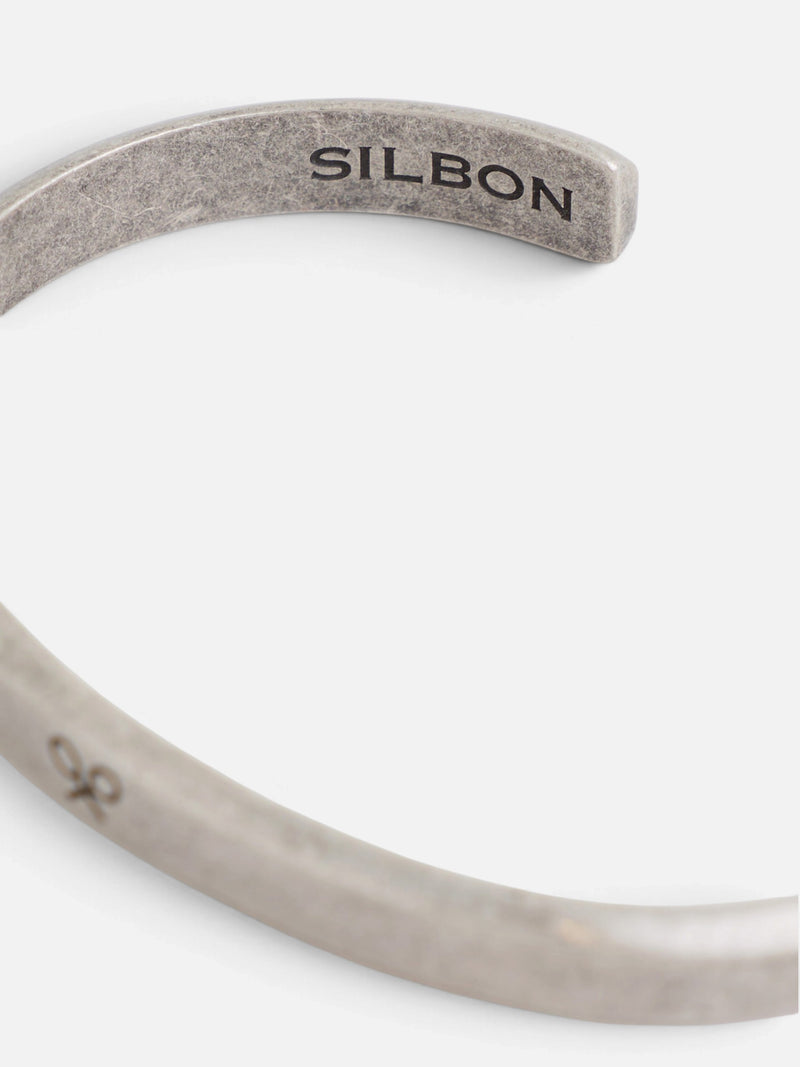 Pulsera metálica grabada