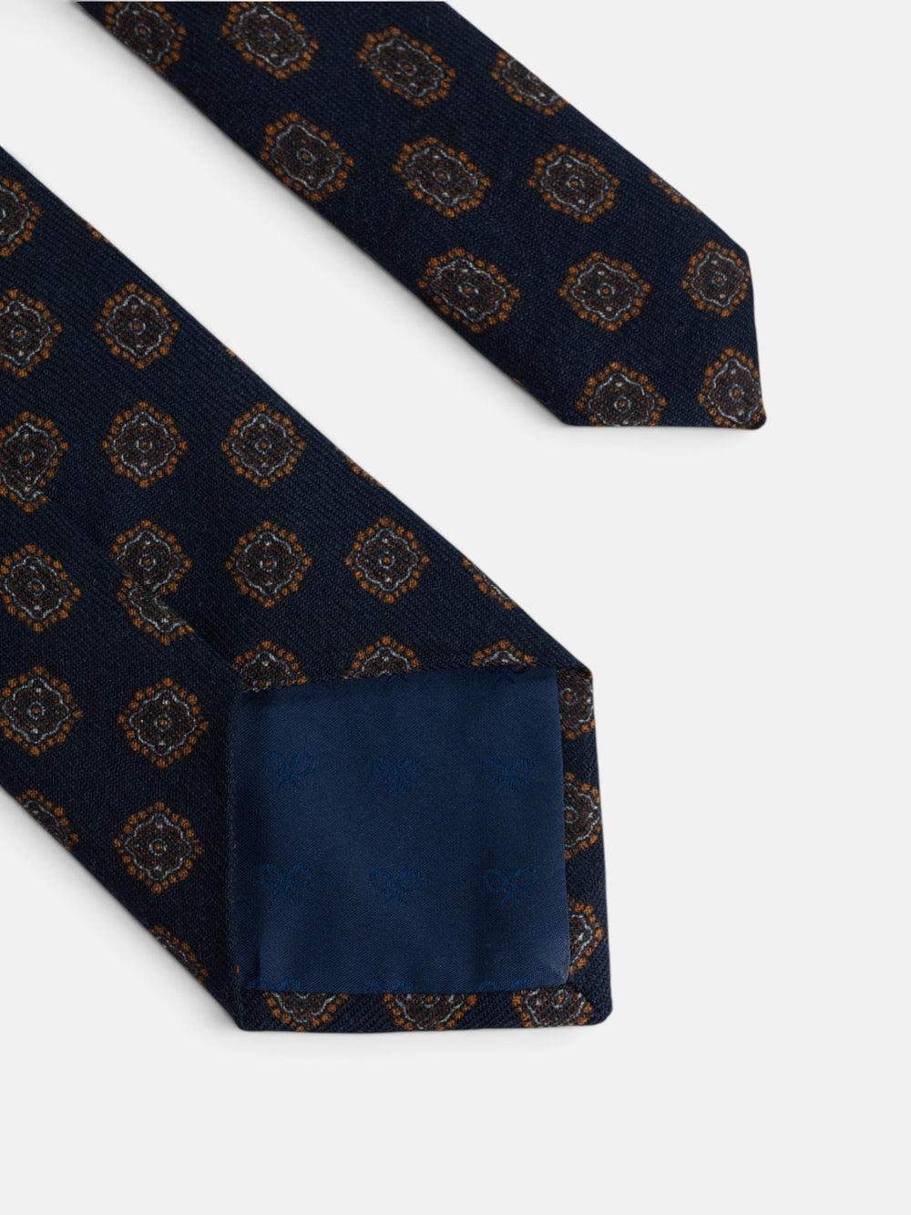 Gravata estampada com medalhão azul-marinho