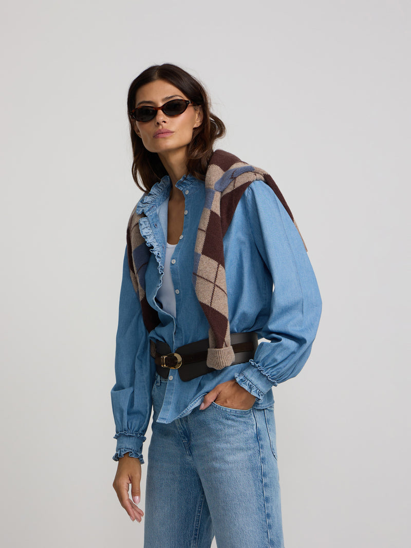Denim shirt with ruffle collar and cuff detail