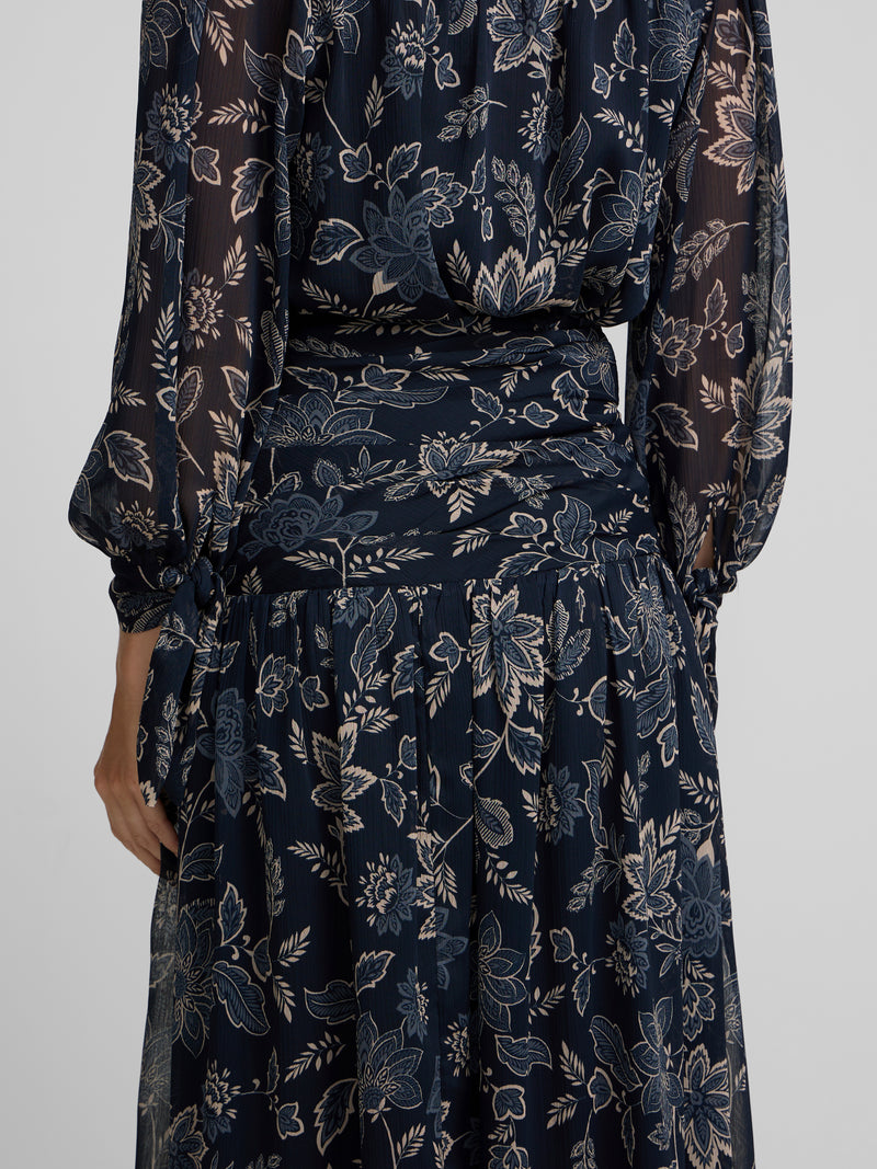 Long skirt with gathered waist and blue floral print