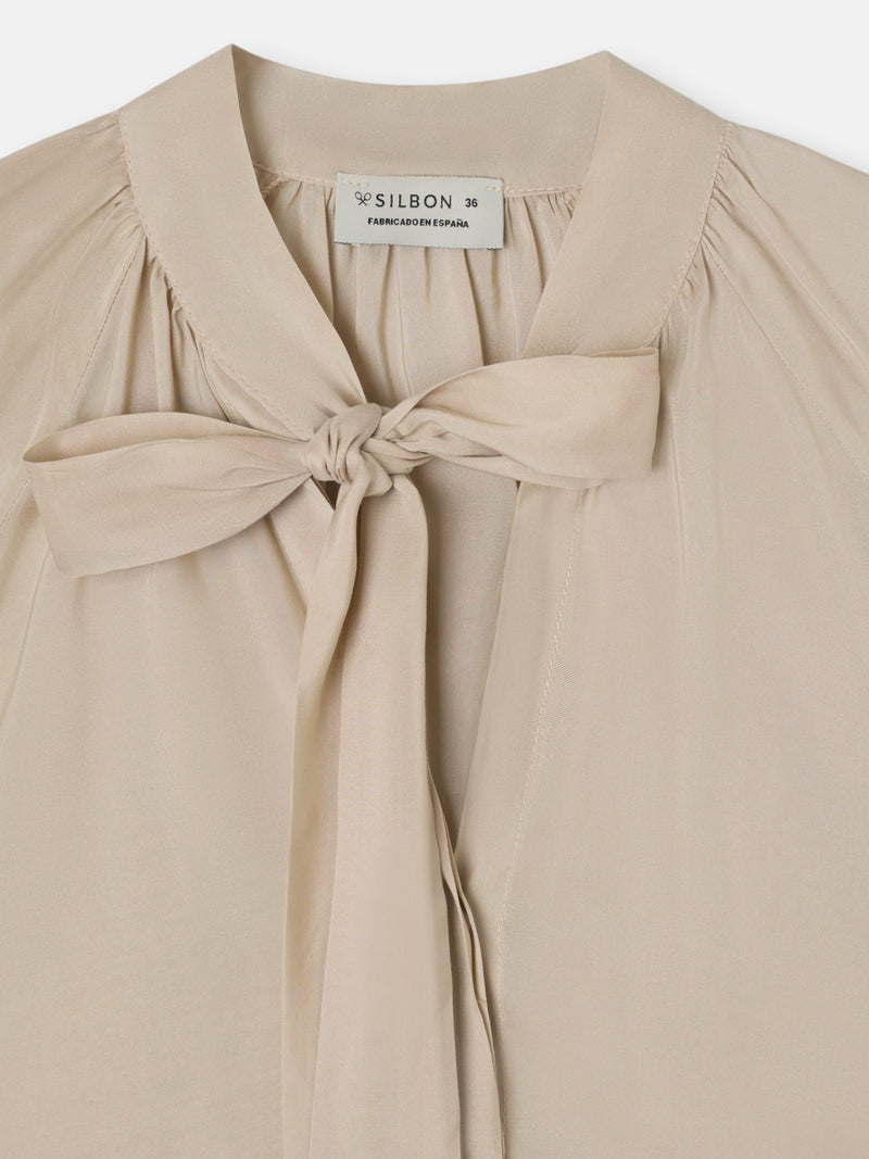 Blouse romantique nouée écrue