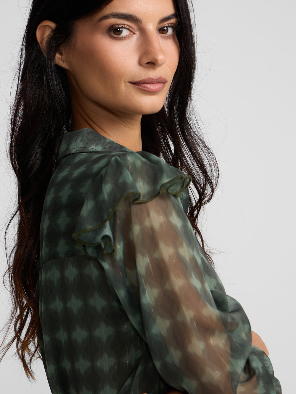 Green ethnic print ruffle blouse