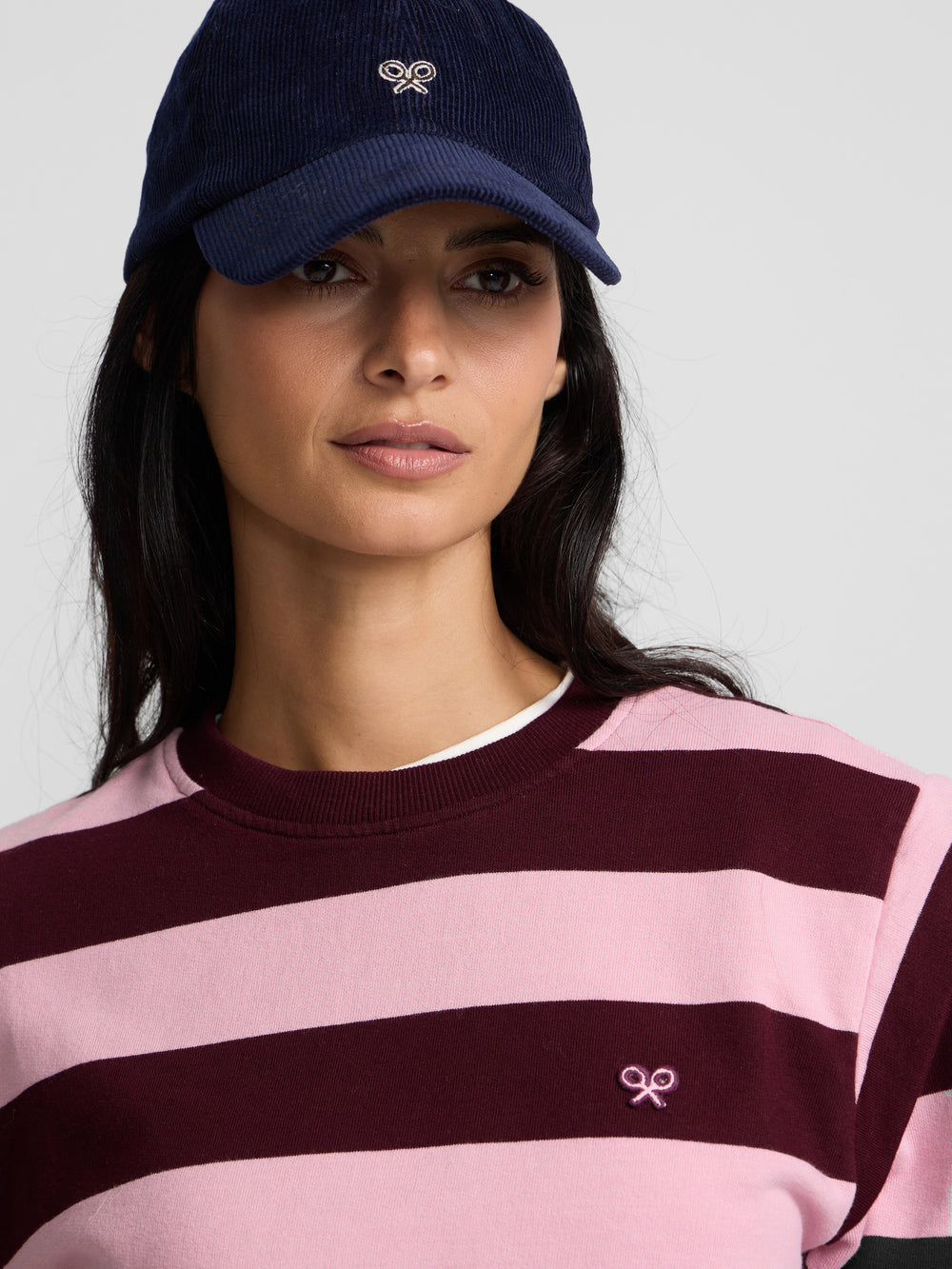 Pink and burgundy striped sweatshirt with shoulder pads