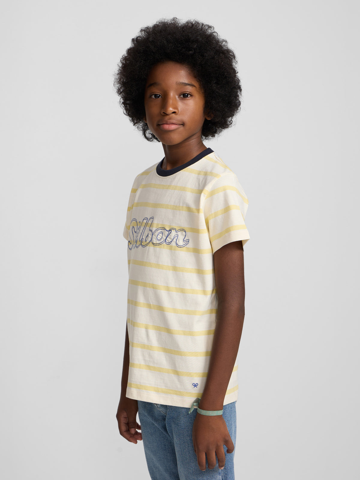 Camiseta kids raya fina stitching amarilla