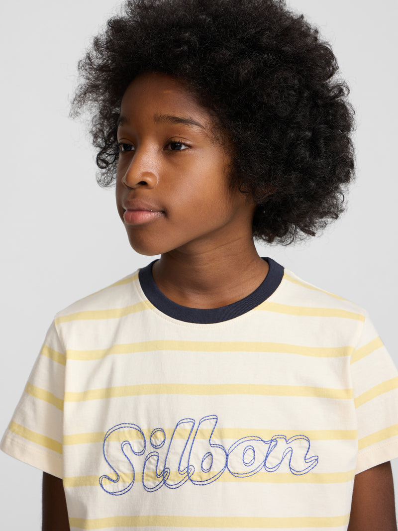 Camiseta kids raya fina stitching amarilla