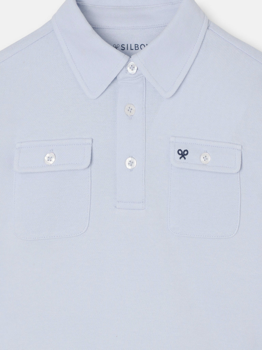 Polo kids bolsillos azul