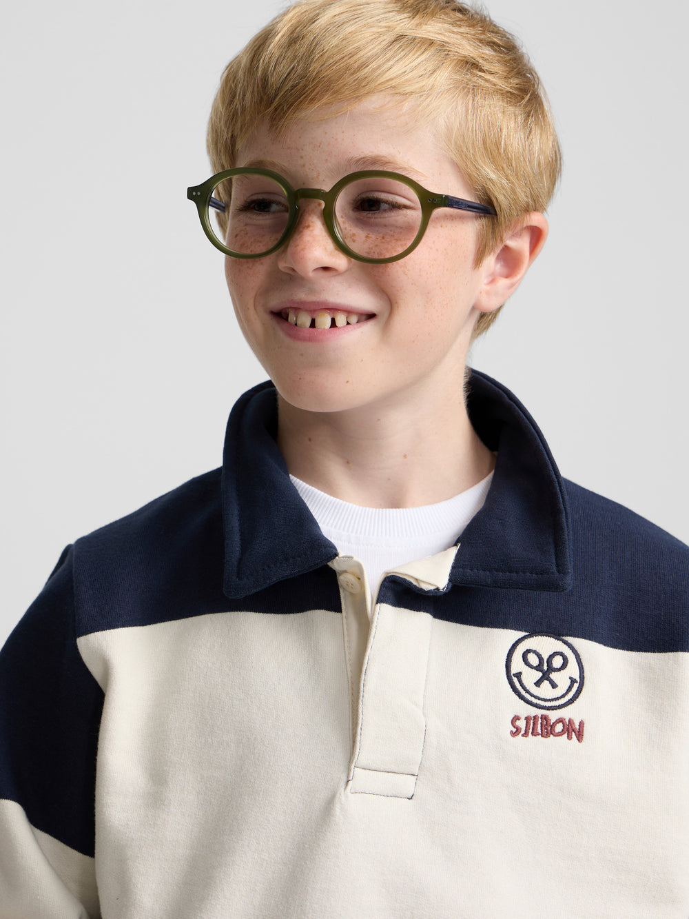 Kids' sweatshirt with striped polo collar and navy blue smile