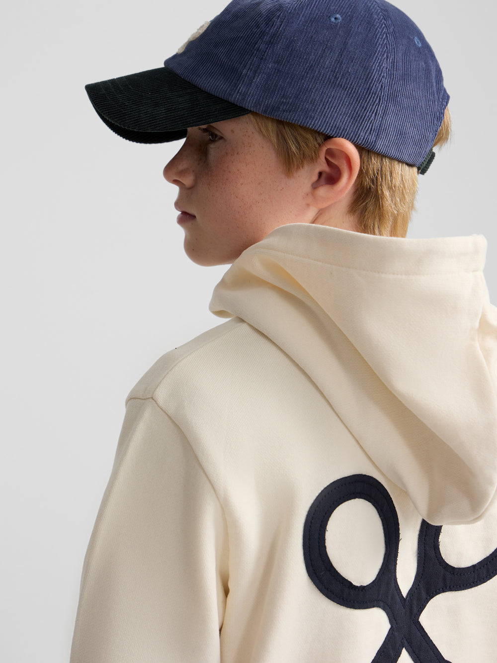 Kids hoodie with contrasting patch in cream