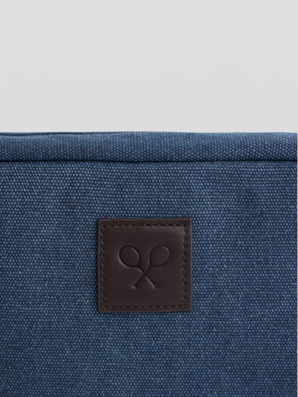 Navy blue leather detail toiletry bag