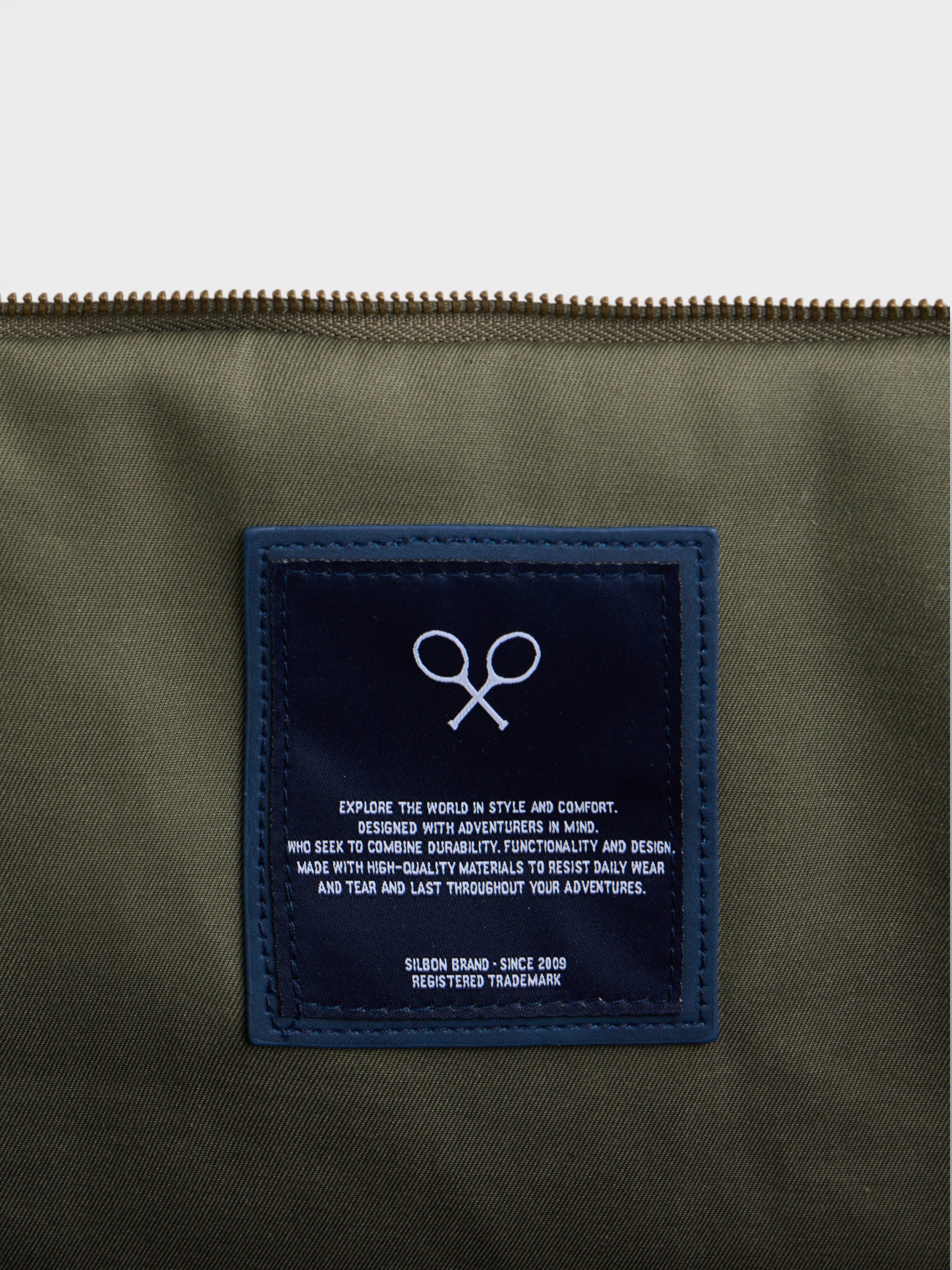 Sac de voyage avec détail en cuir vert