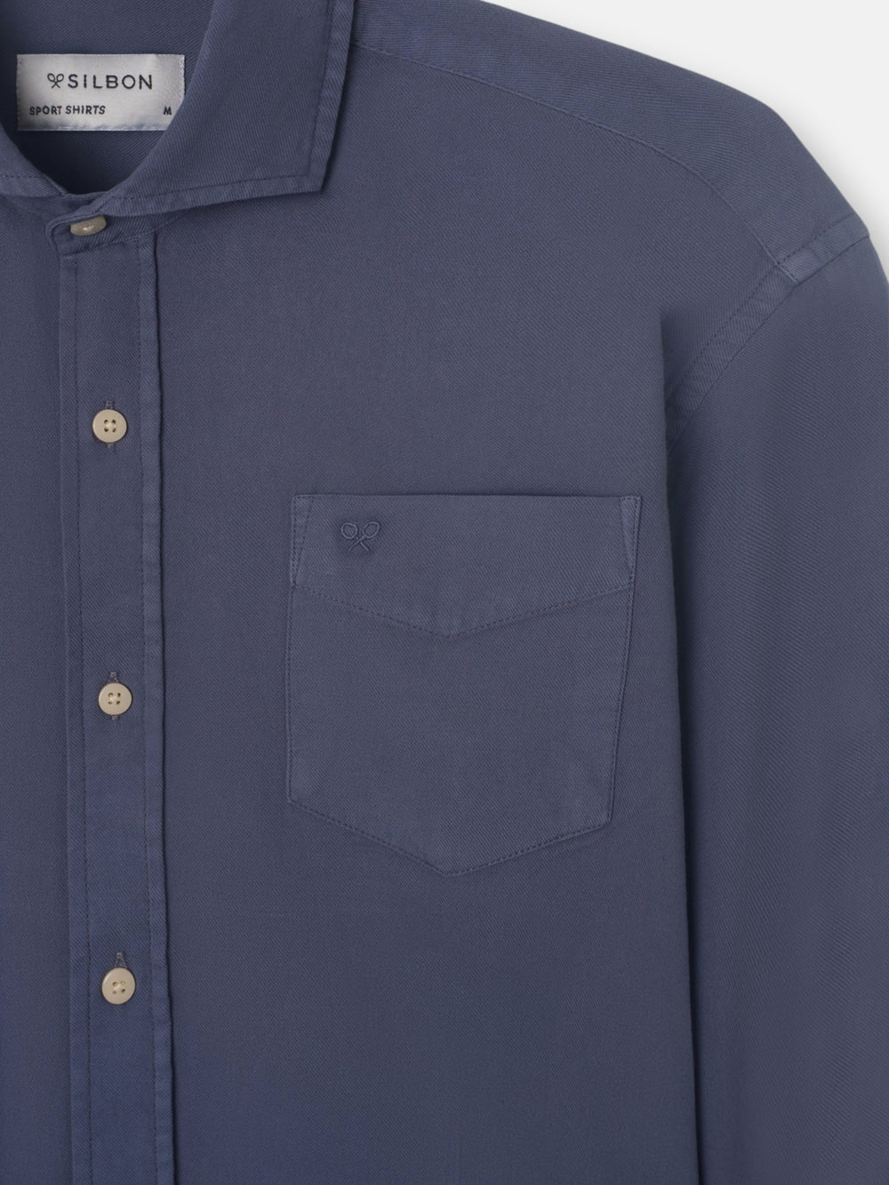 Blue worn pocket sport shirt