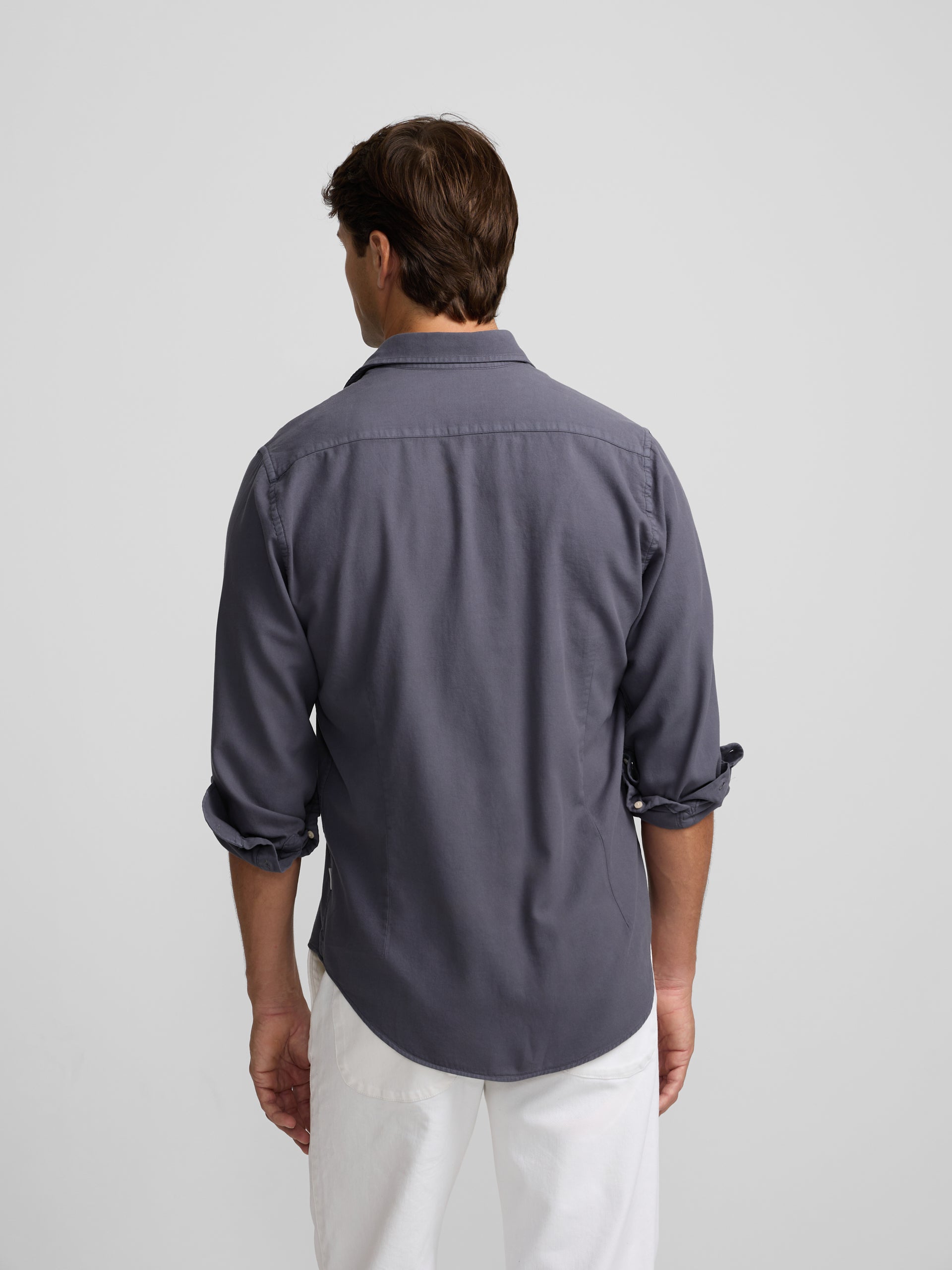 Chemise sport bleue à poche usée